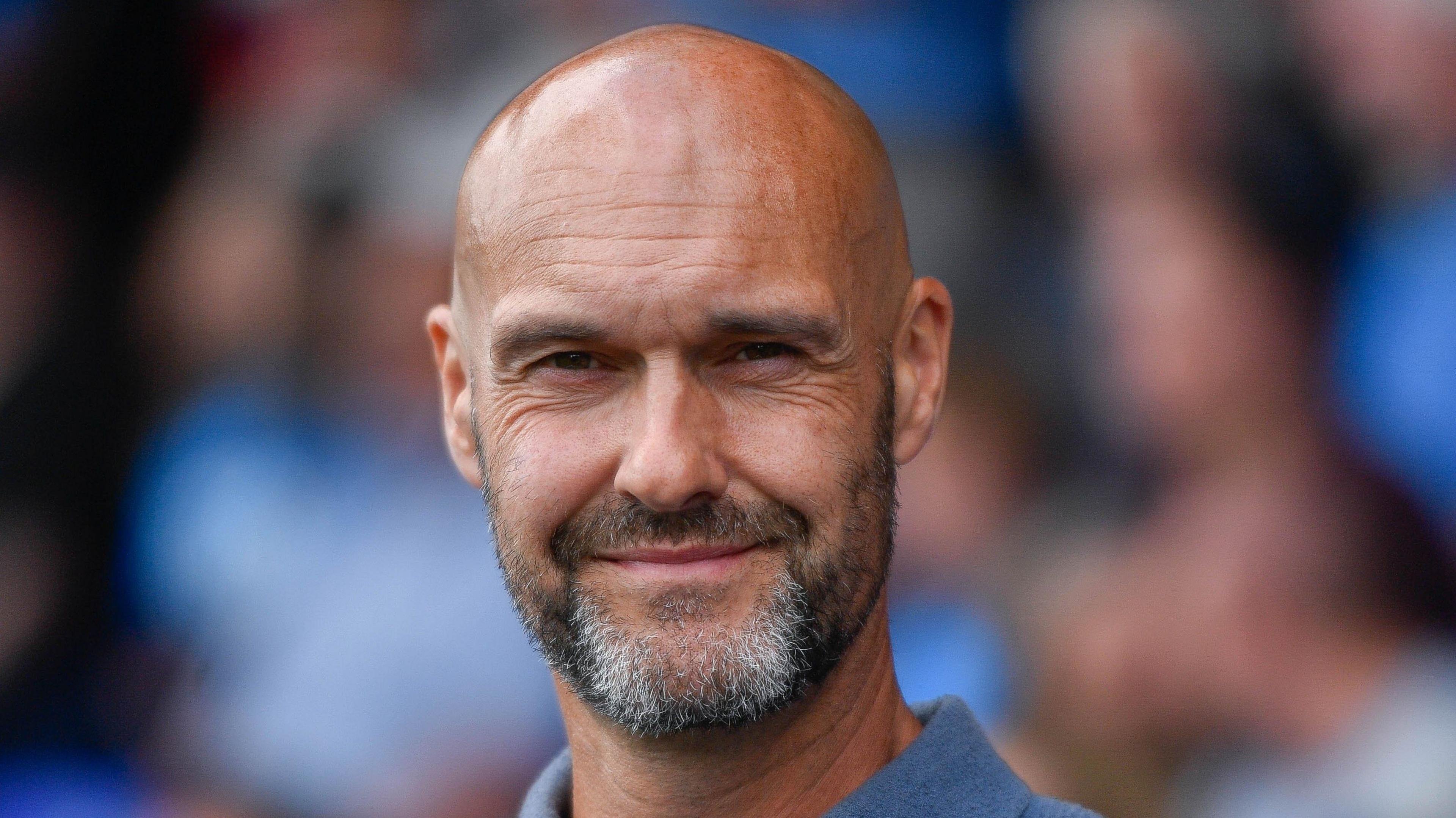 Peterborough United boss Luke Williams smiling