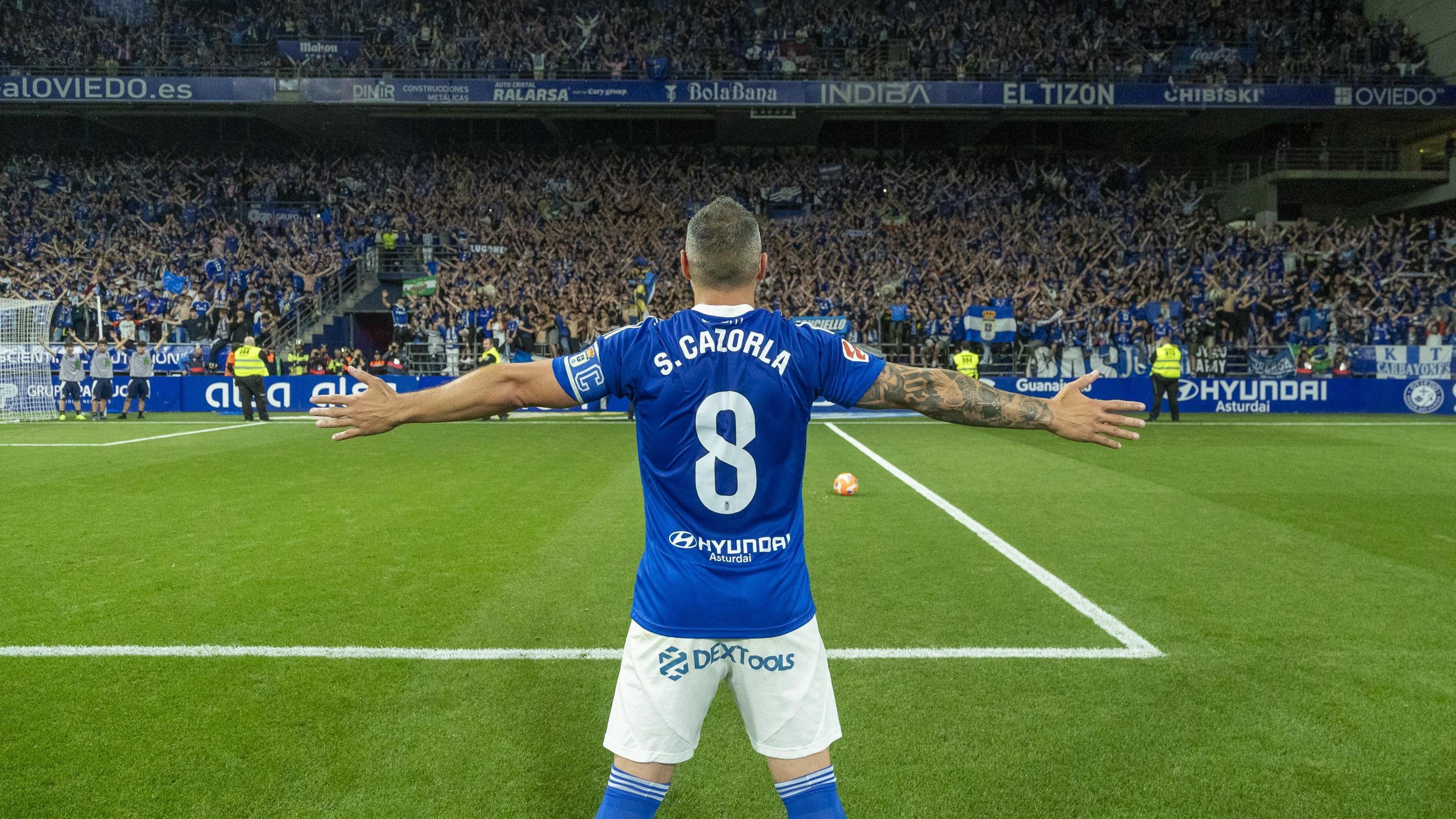 Santi Cazorla celebrates in front of Real Oviedo fans