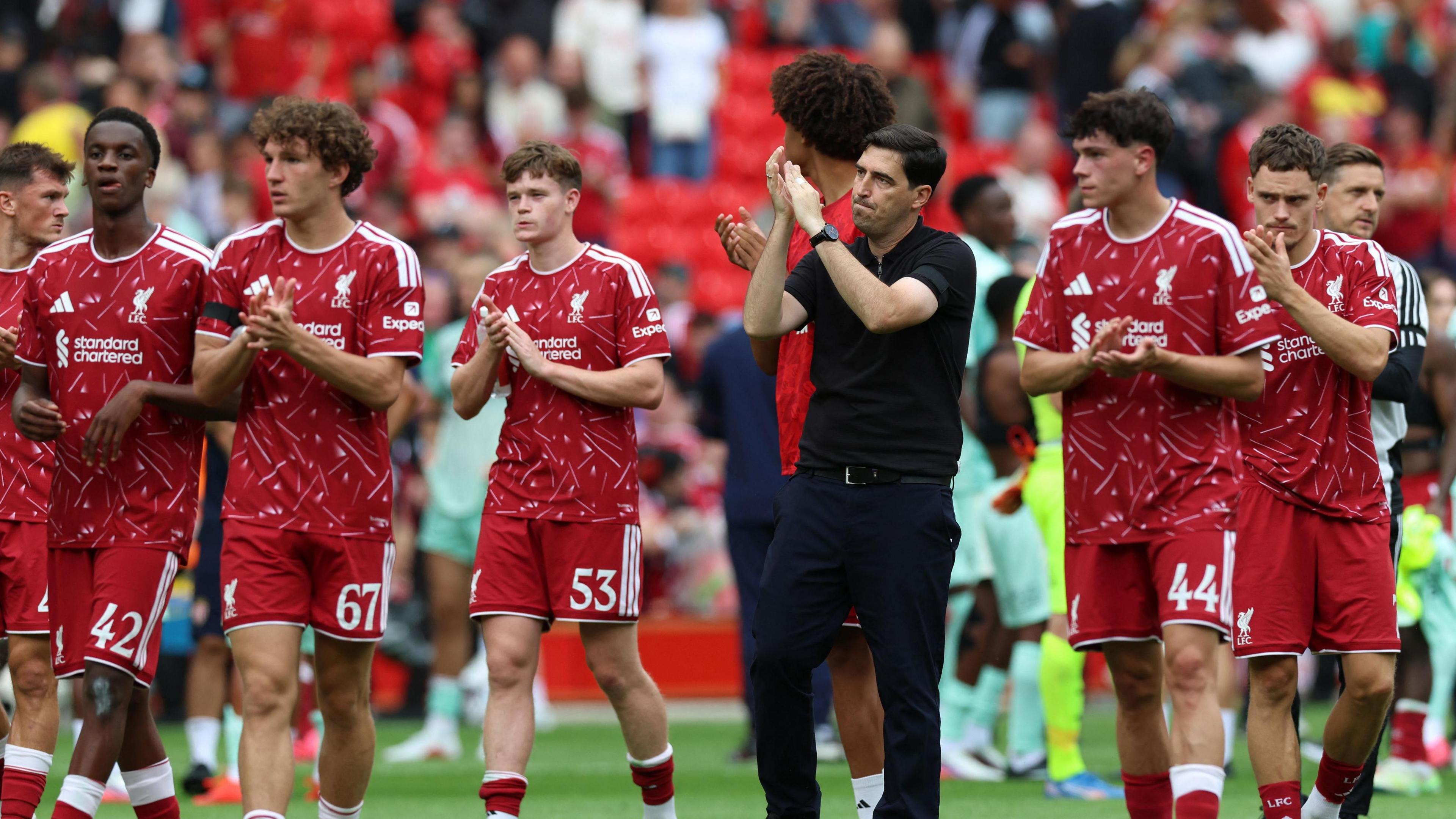 Andoni Iraola applauds the Anfield crowd