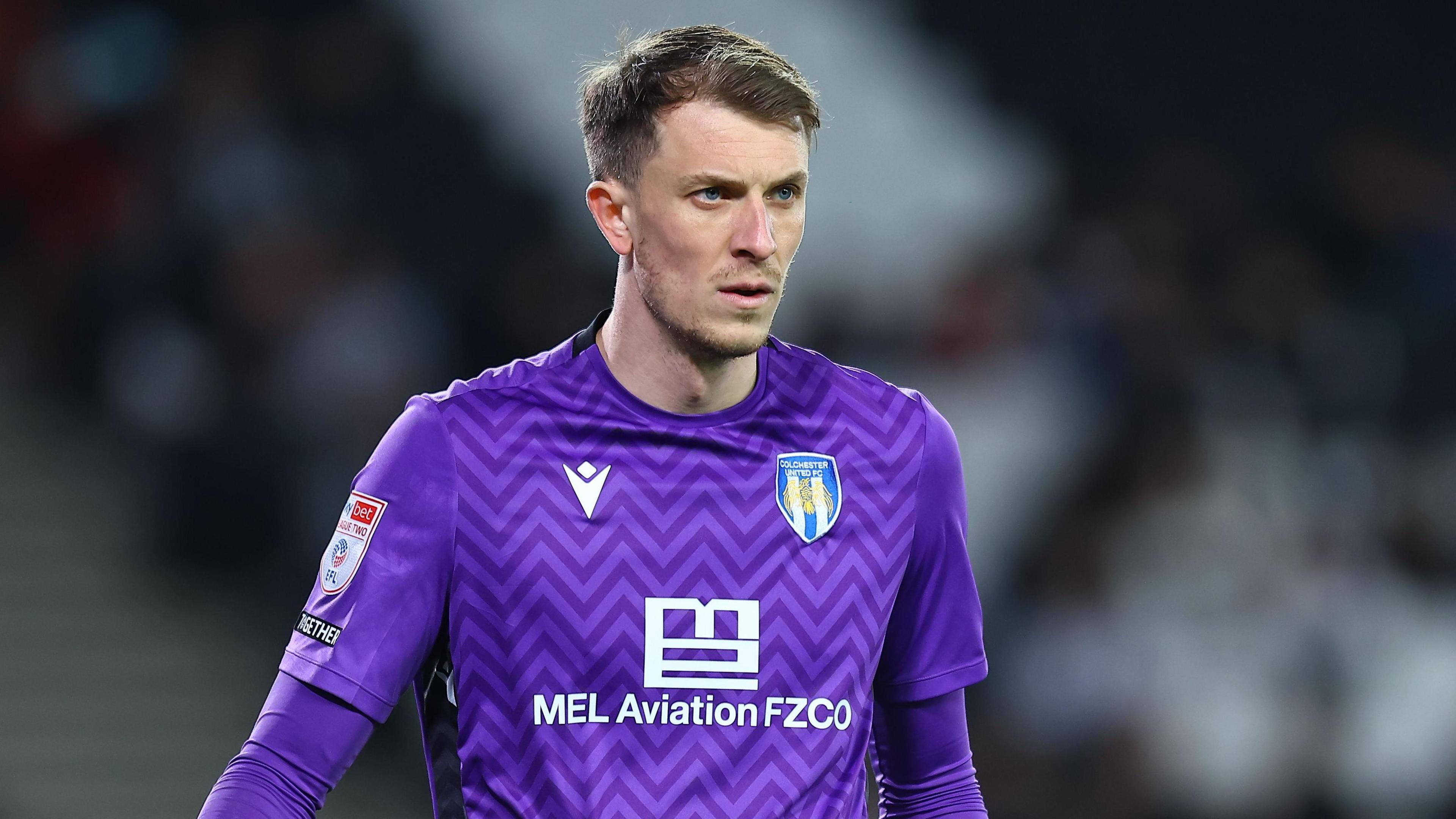 Matt Macey in action for Colchester United during the 2025-26 season