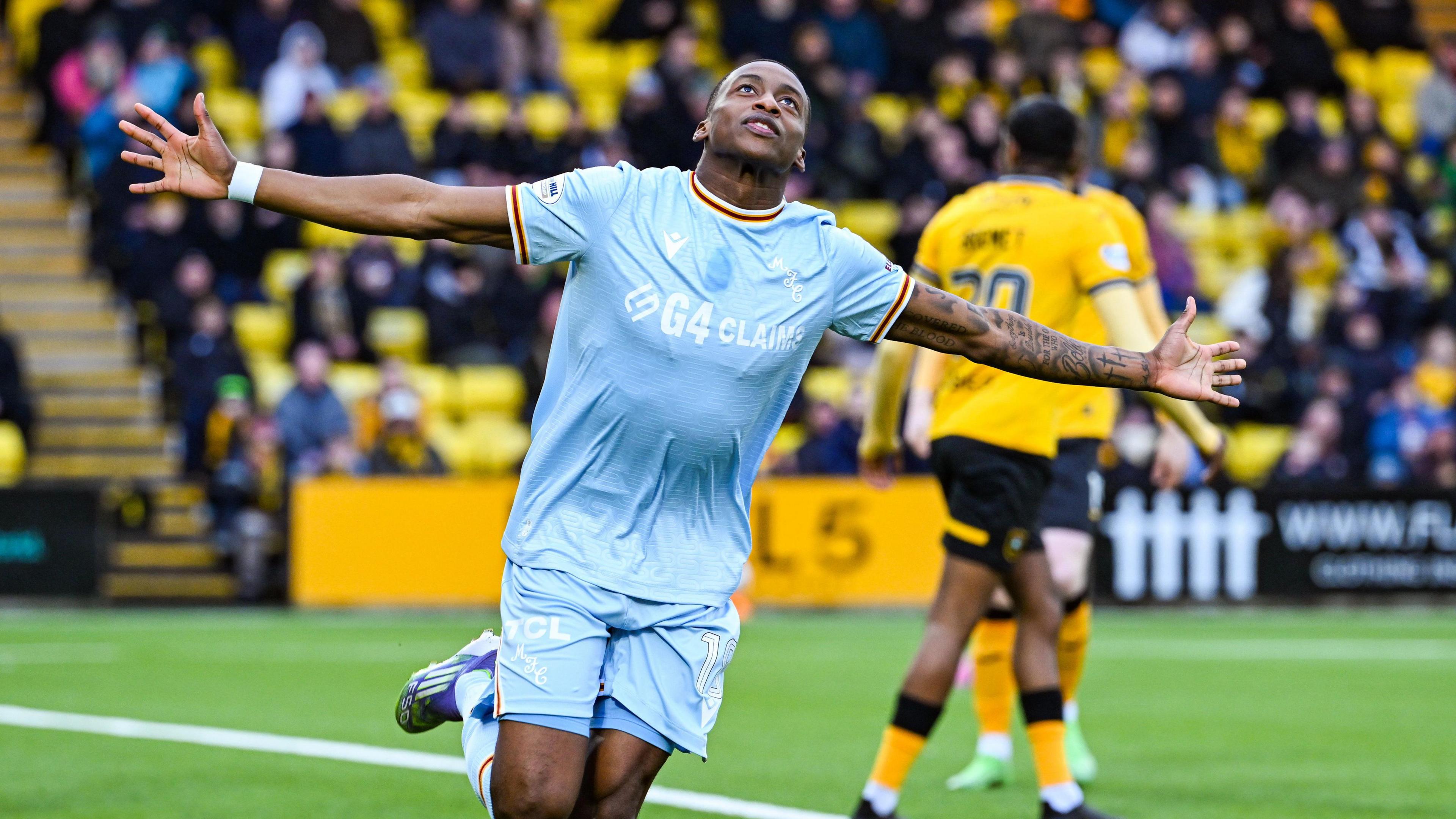 Tawanda Maswanhise celebrates