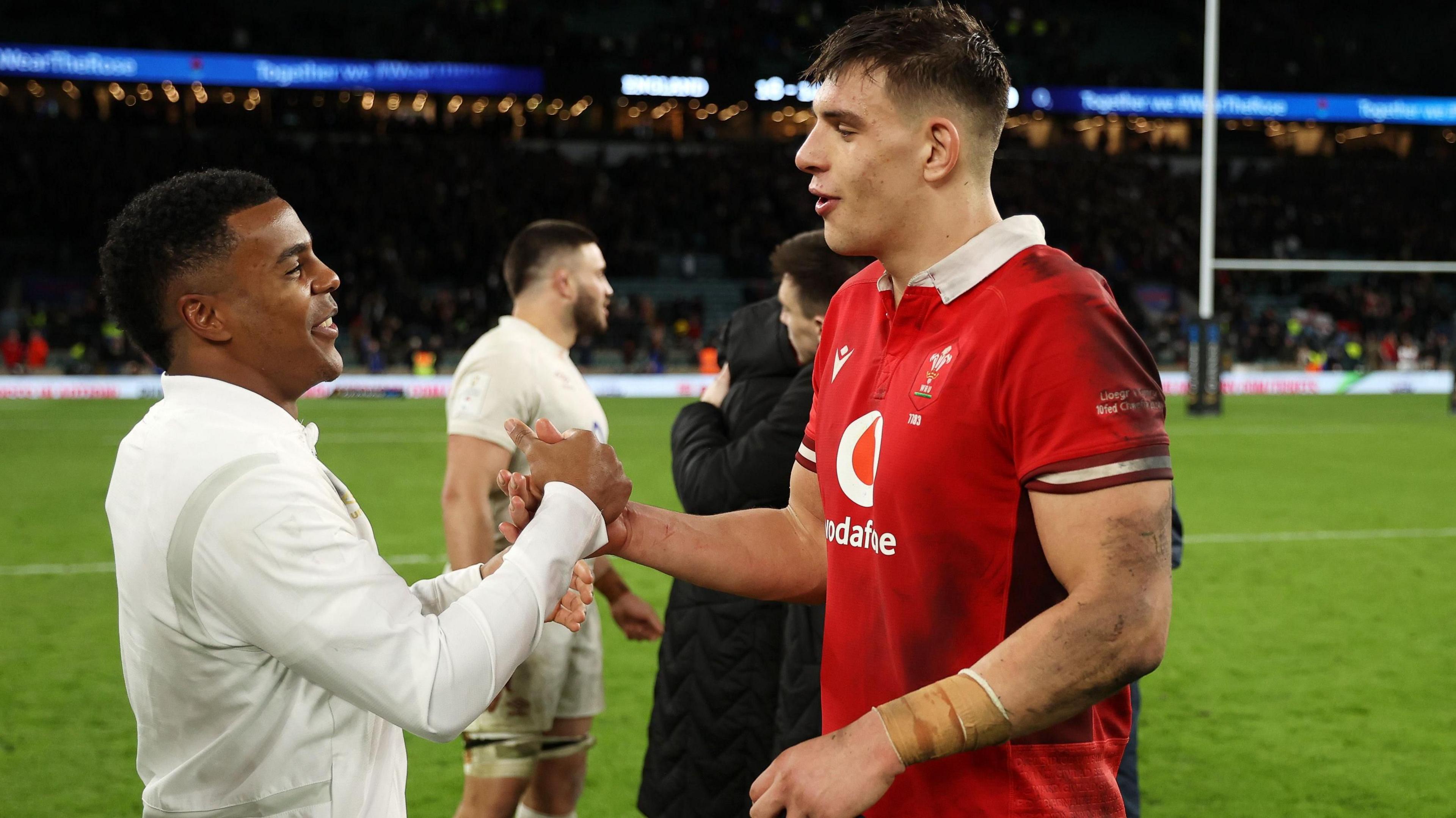 Immanuel Fey-Waboso and Dafydd Jenkins shake hands