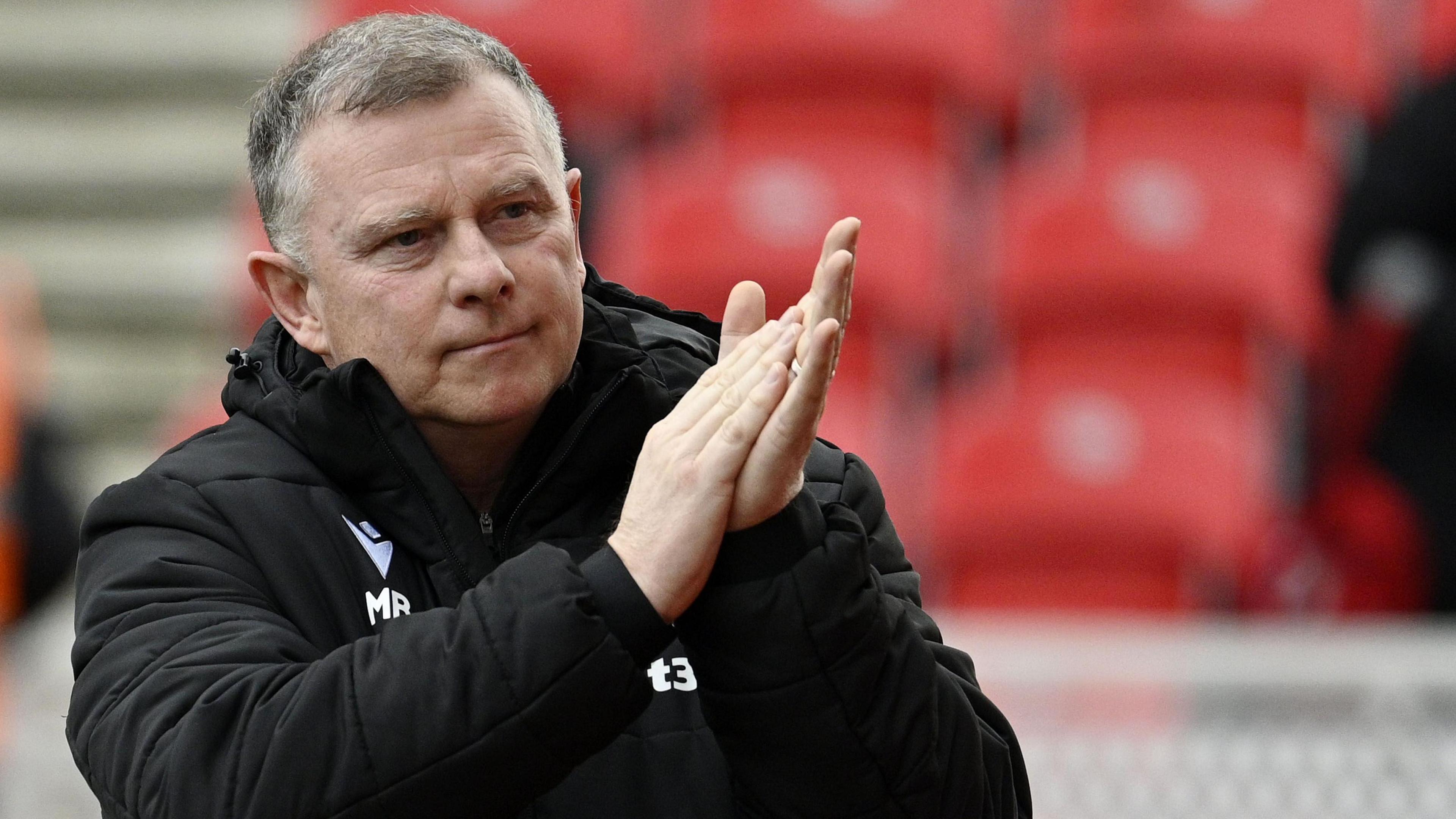 New Stoke City boss Mark Robins acknowledges the Potters fans