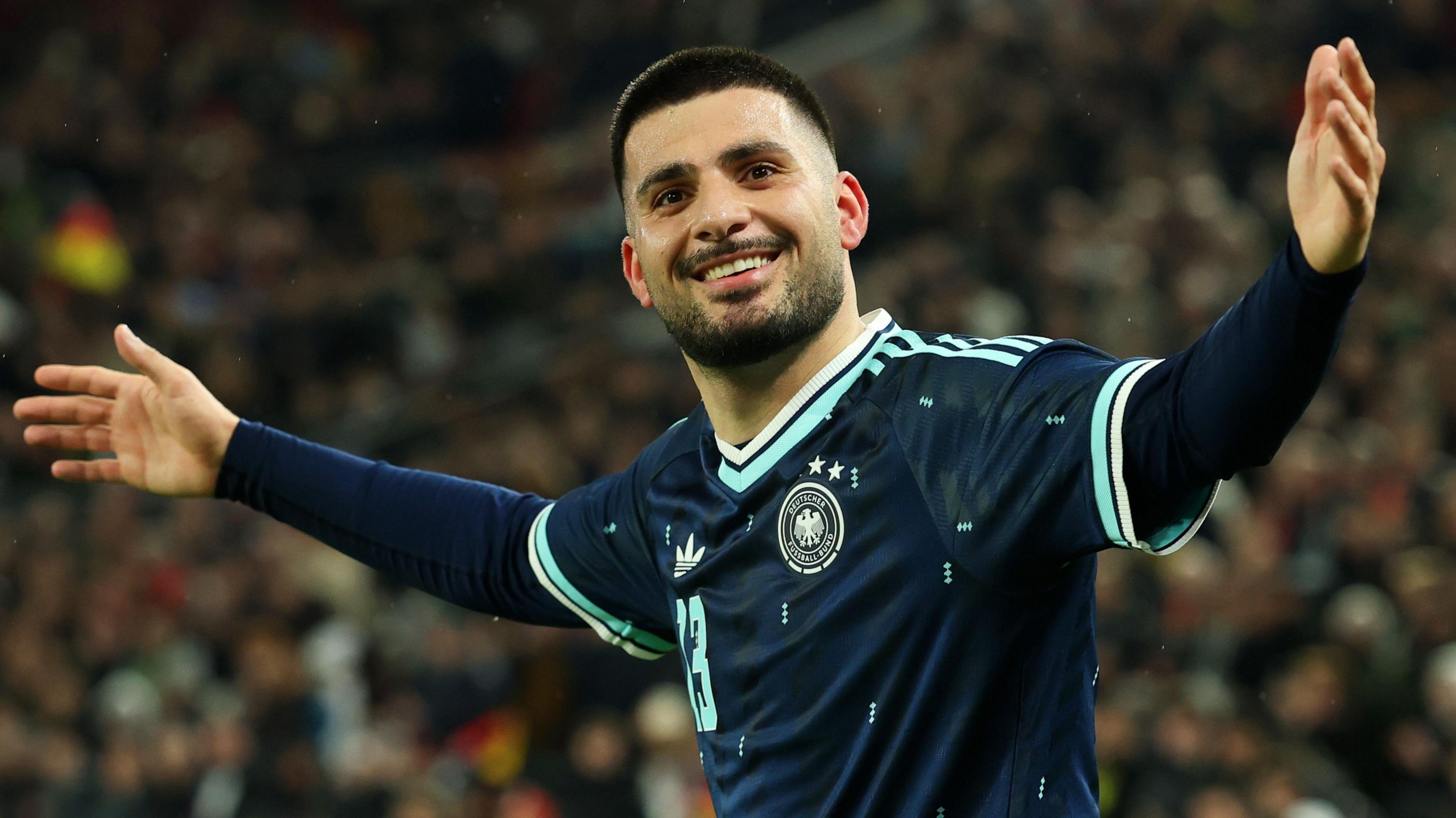 Deniz Undav celebrates scoring Germany's second goal 