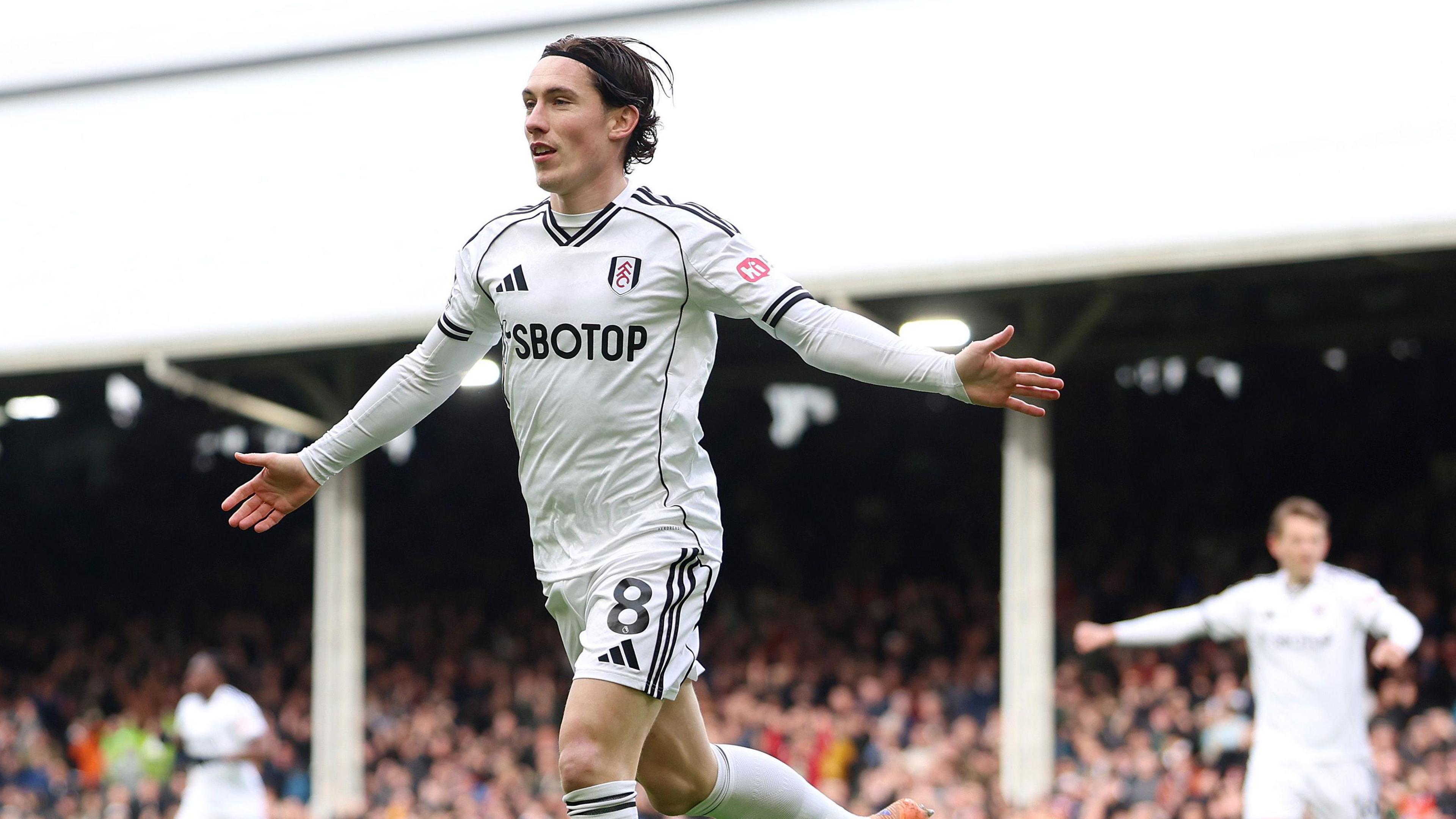 Fulham attacker Harry Wilson celebrates scoring in the Premier League