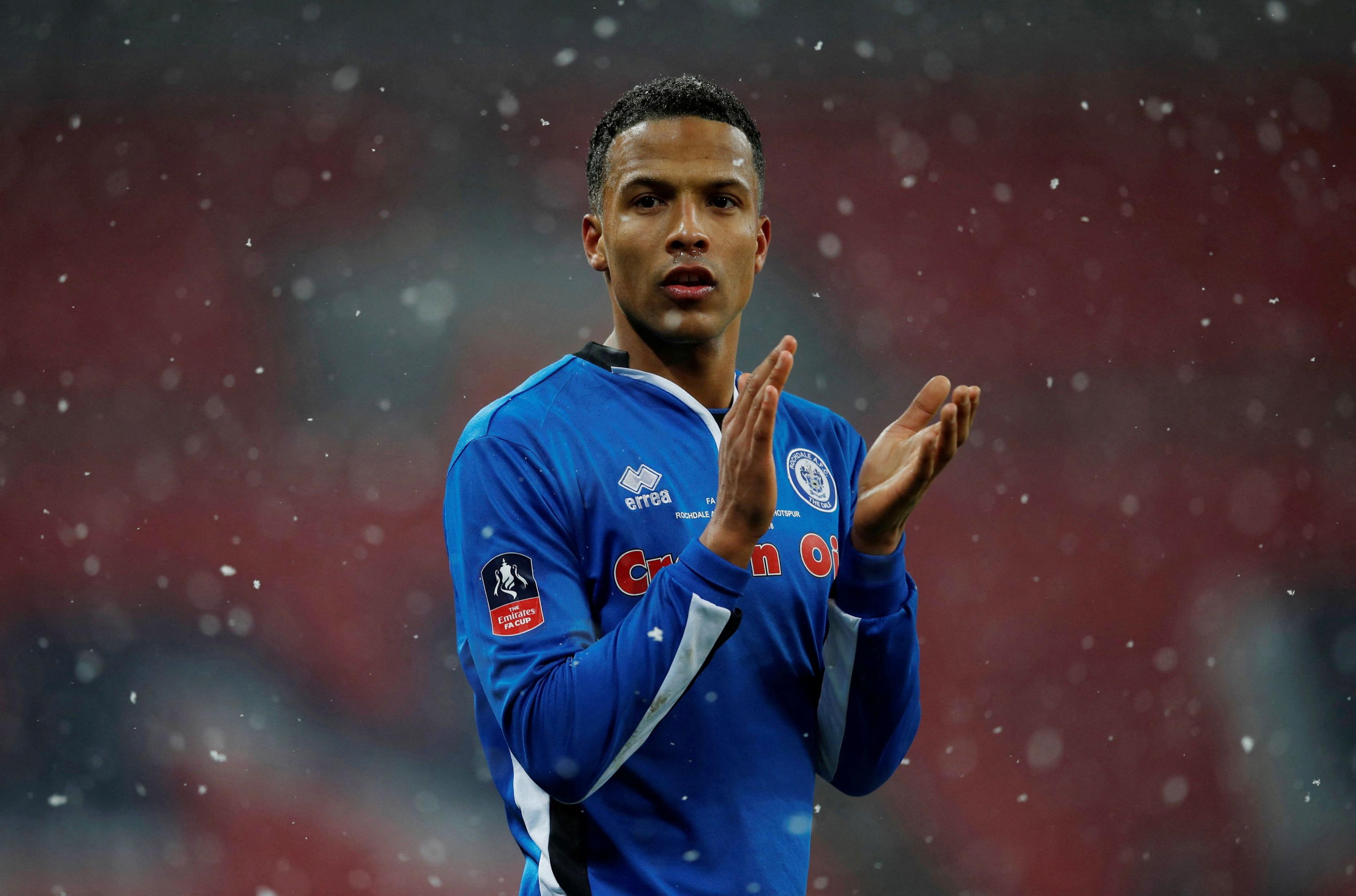 Joe Thompson applauds Rochdale's fans after their FA Cup fifth round replay against Tottenham Hotspur at Wembley Stadium in February 2018