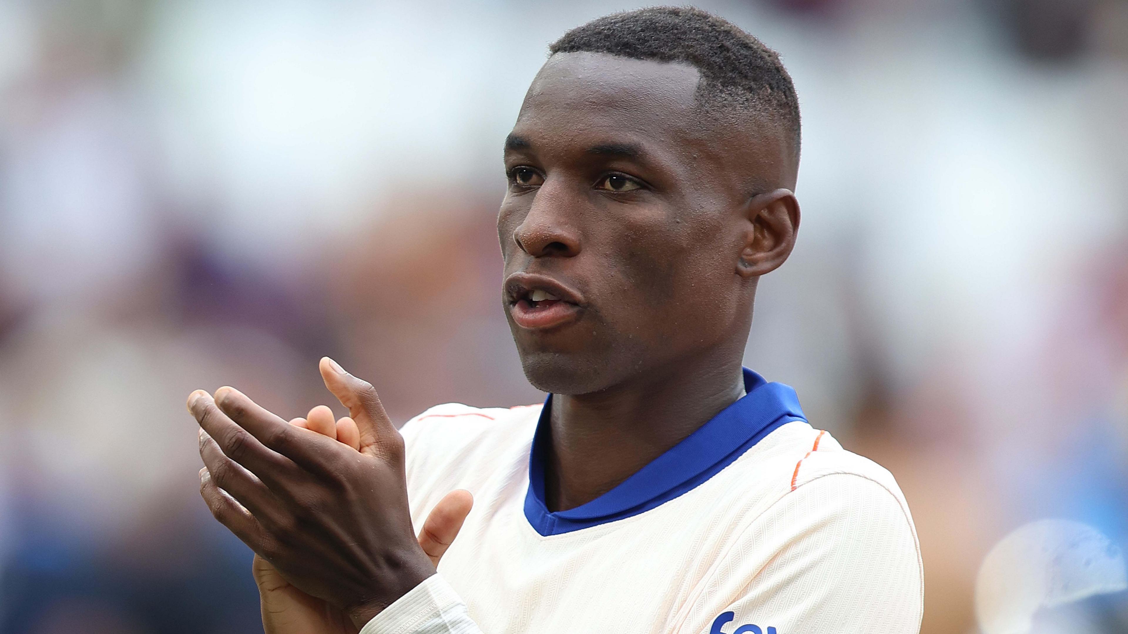 Chelsea striker Nicolas Jackson applauds fans after being substituted in the 64th minute against West Ham