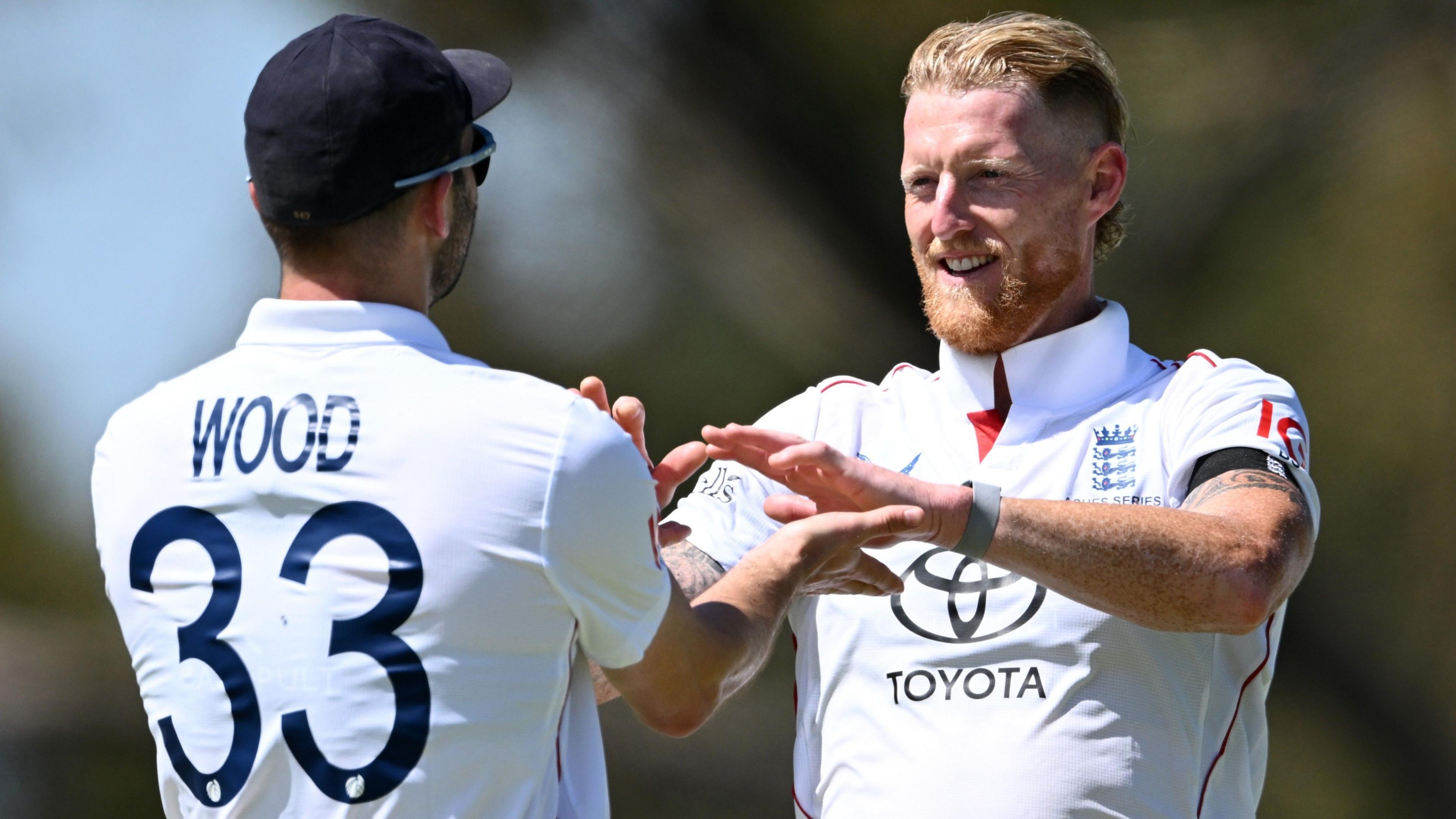 Ben Stokes celebrates a wicket with Mark Wood