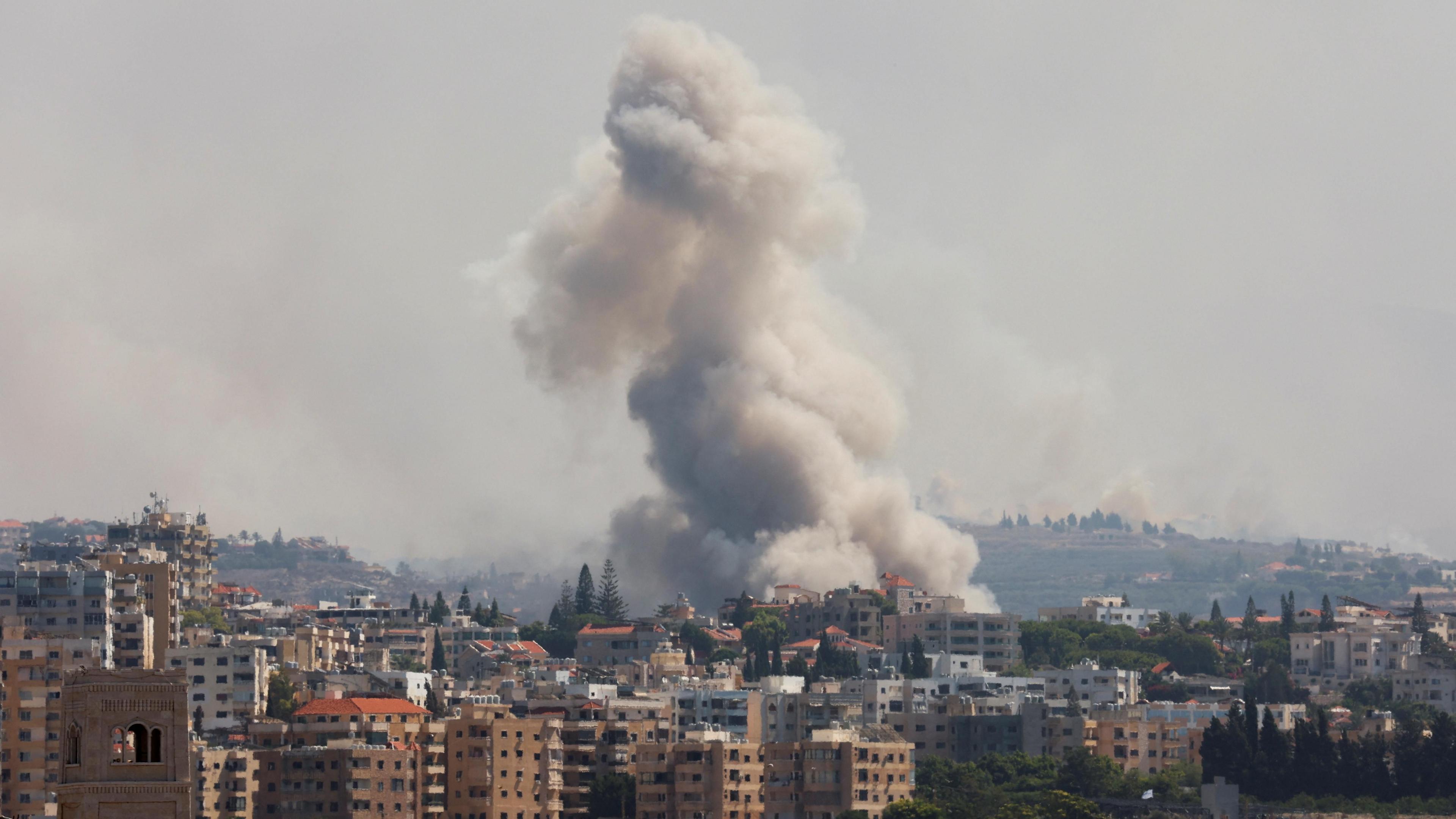 Smoke billows following an Israeli strike near Tyre, southern Lebanon (23 September 2024)