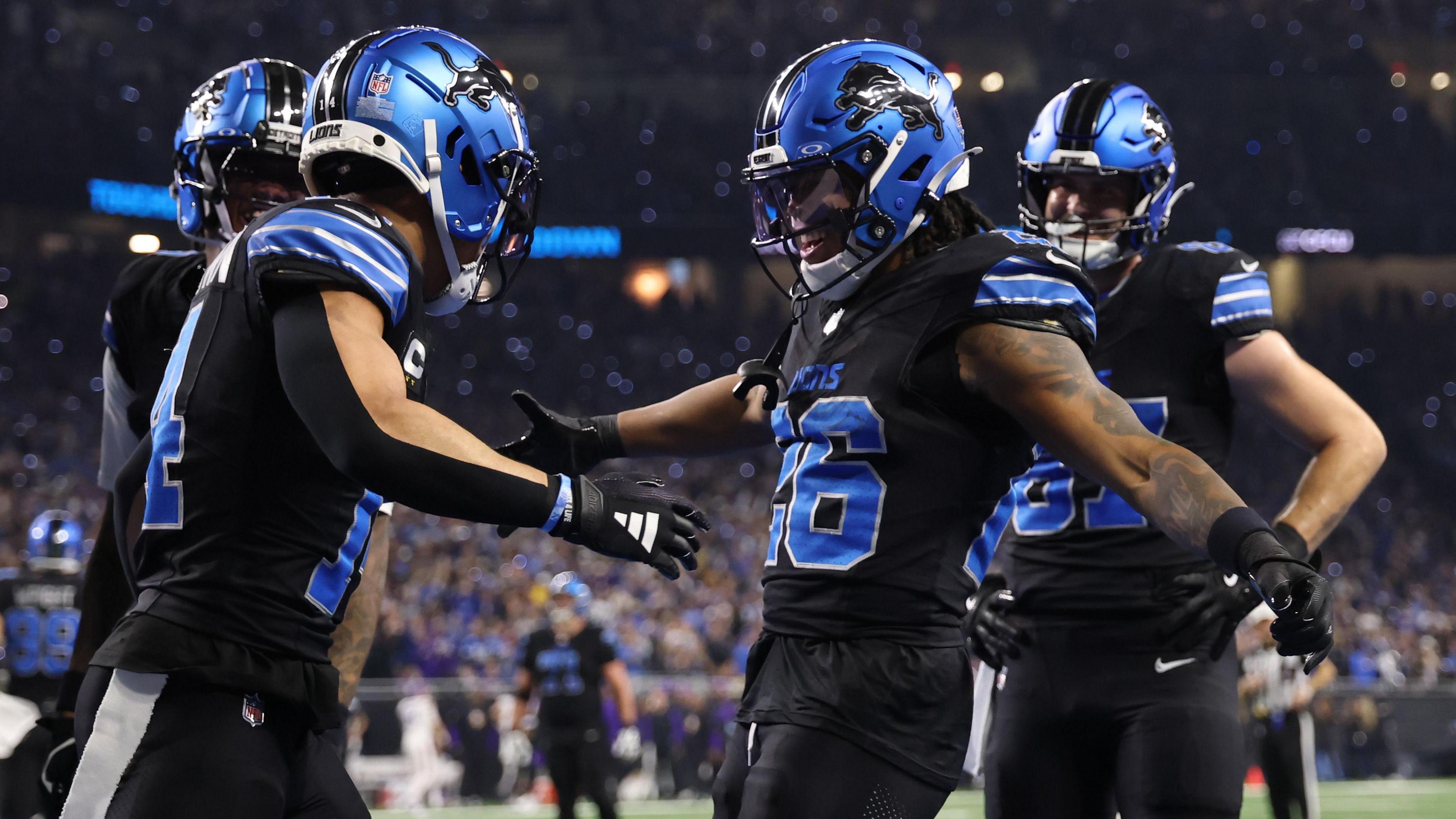 The Detroit Lions celebrate scoring a touchdown in the NFL