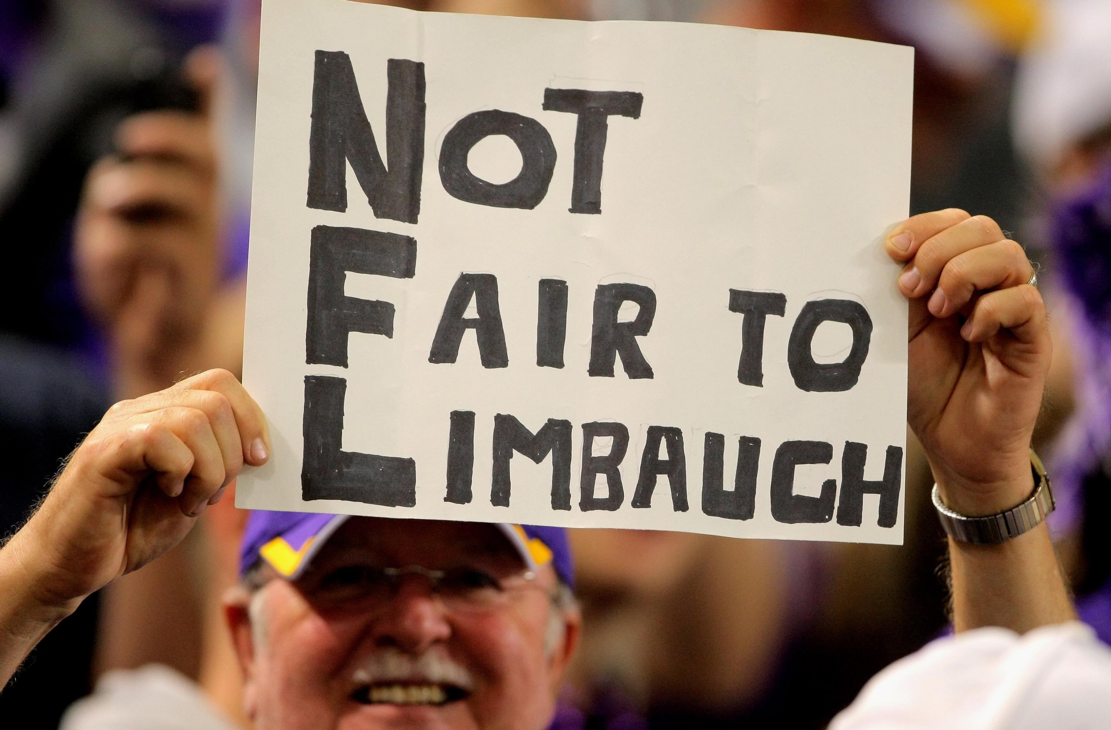 Limbaugh fan with sign against the National Football League