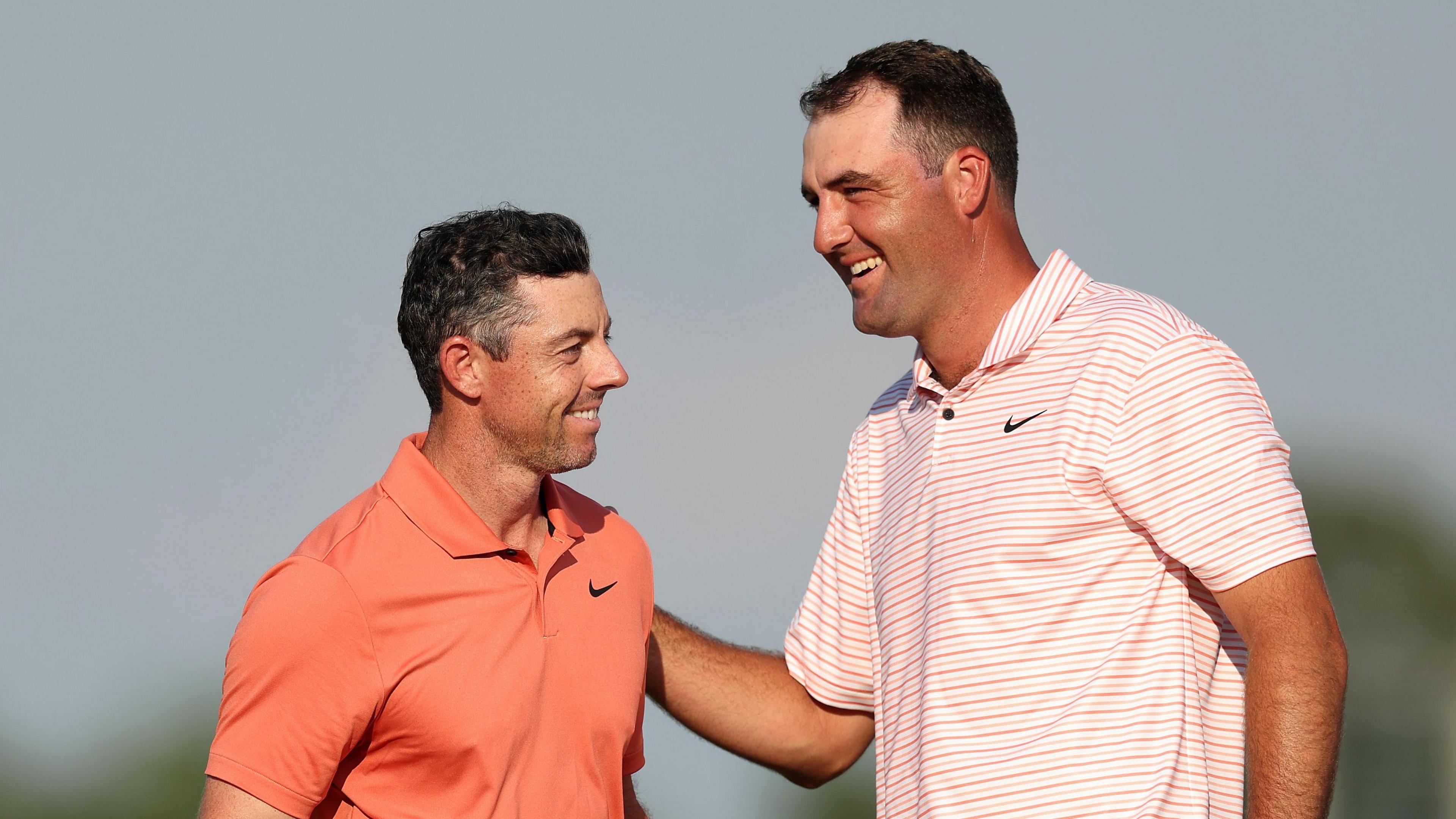 Rory McIlroy and Scottie Scheffler embrace