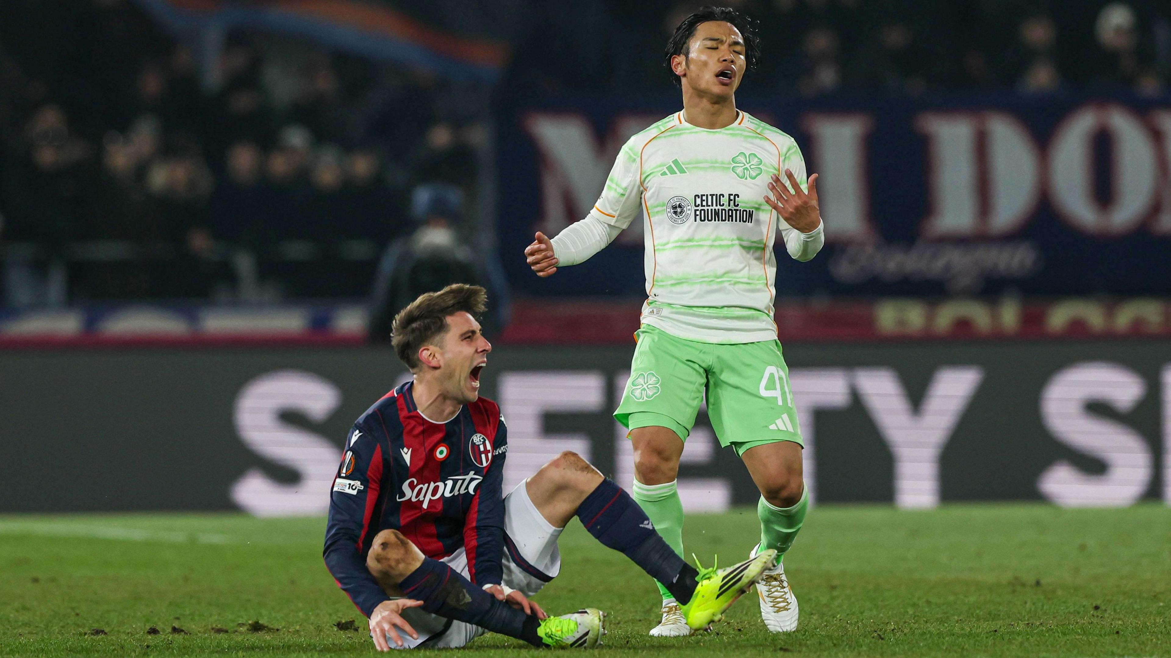 Reo Hatate fouls Bologna's Juan Miranda and receives his second yellow card