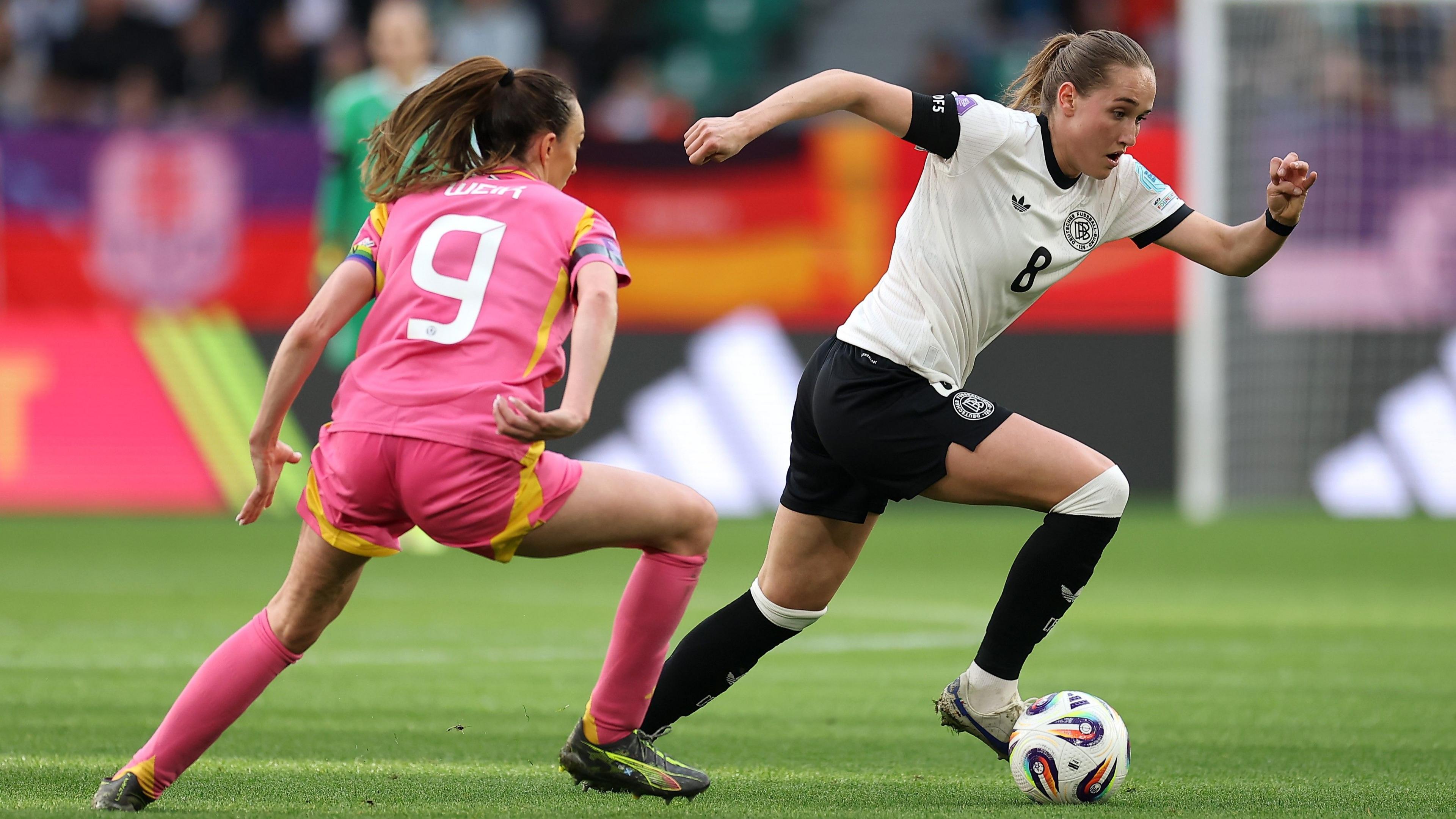 Scotland's Caroline Weir with Germany's Sydney Lohmann