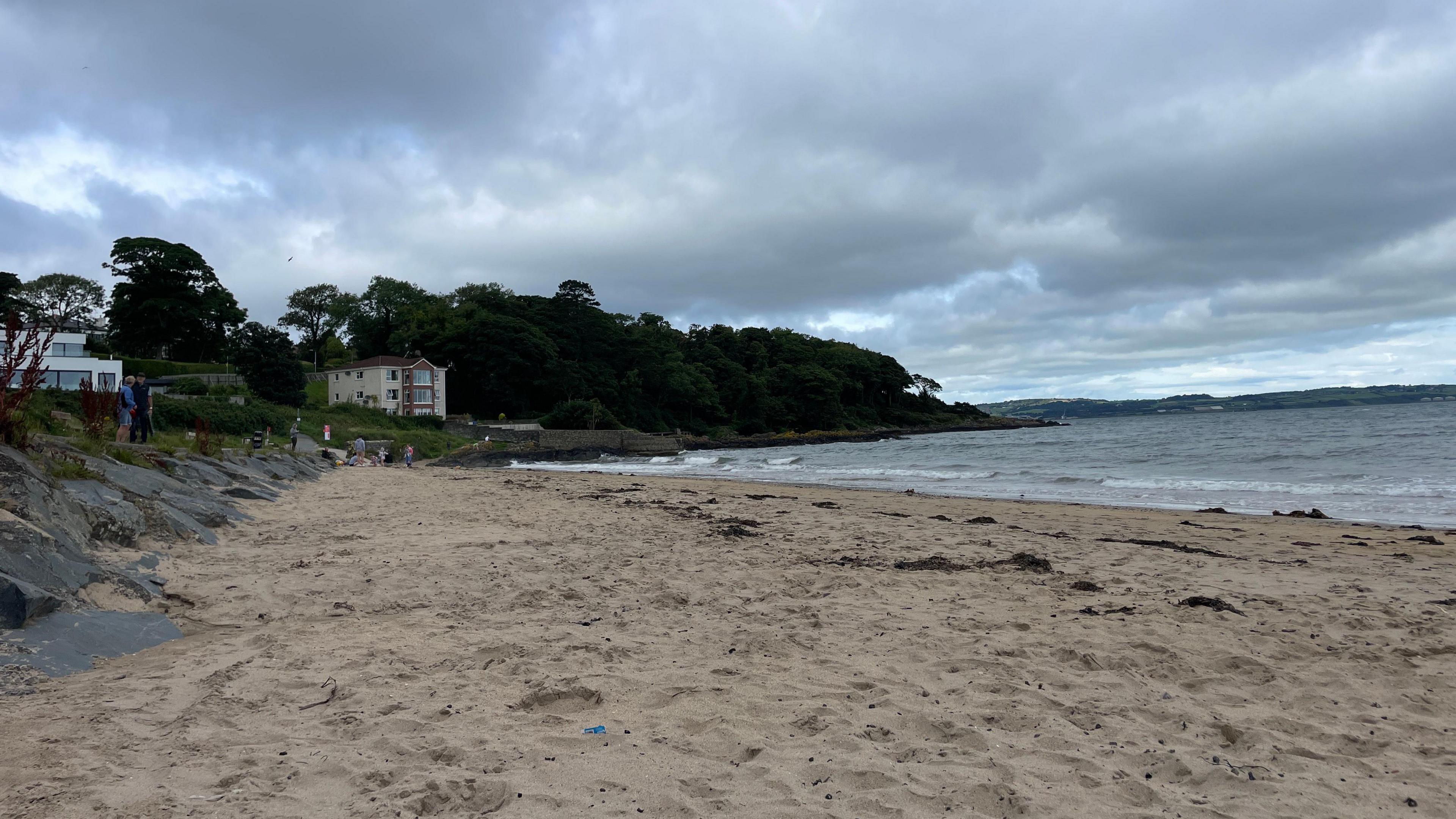 Helen's Bay sandy beach, seen on an overcast day