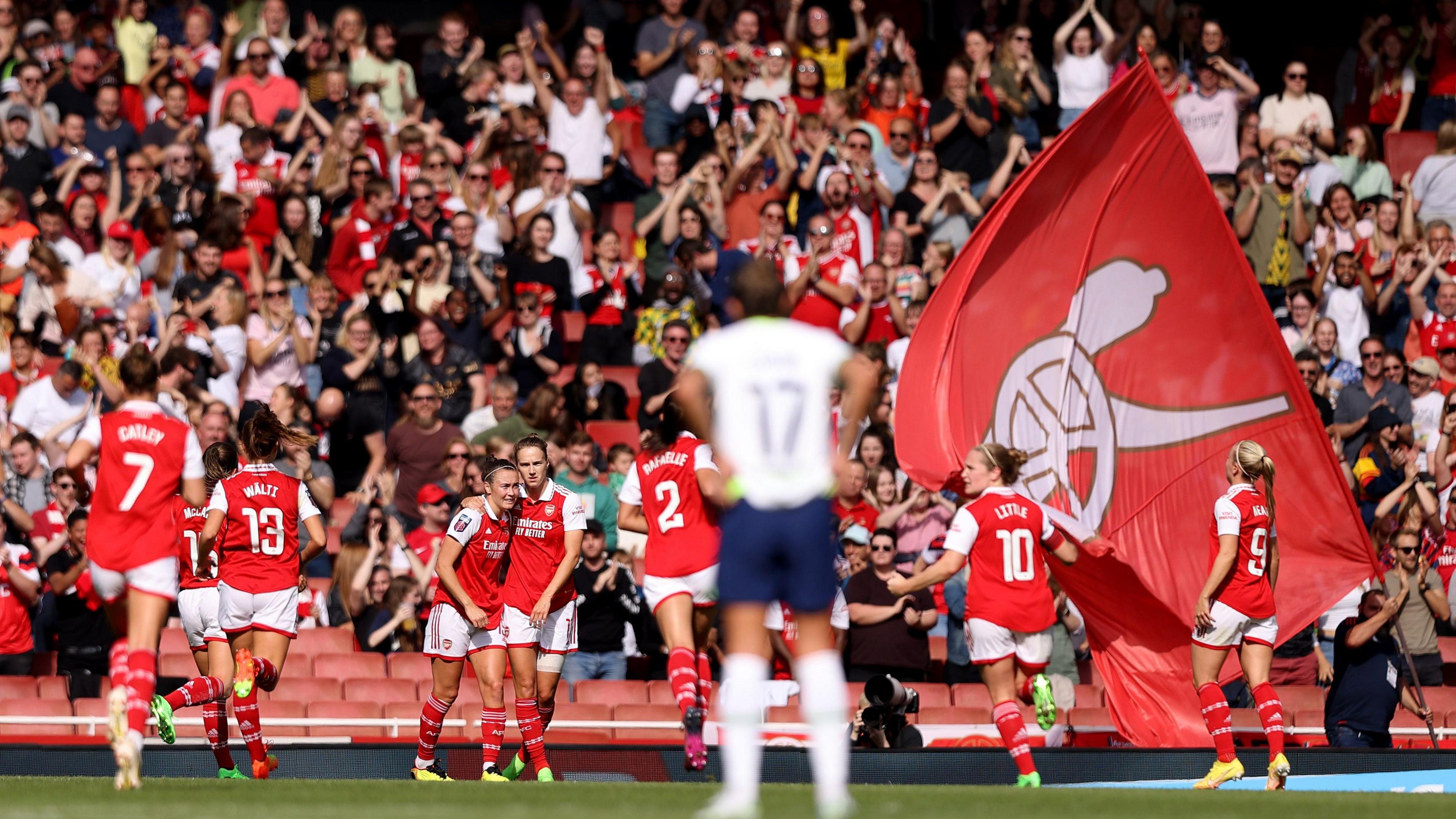 Arsenal celebrate scoring against Tottenham in September 2022