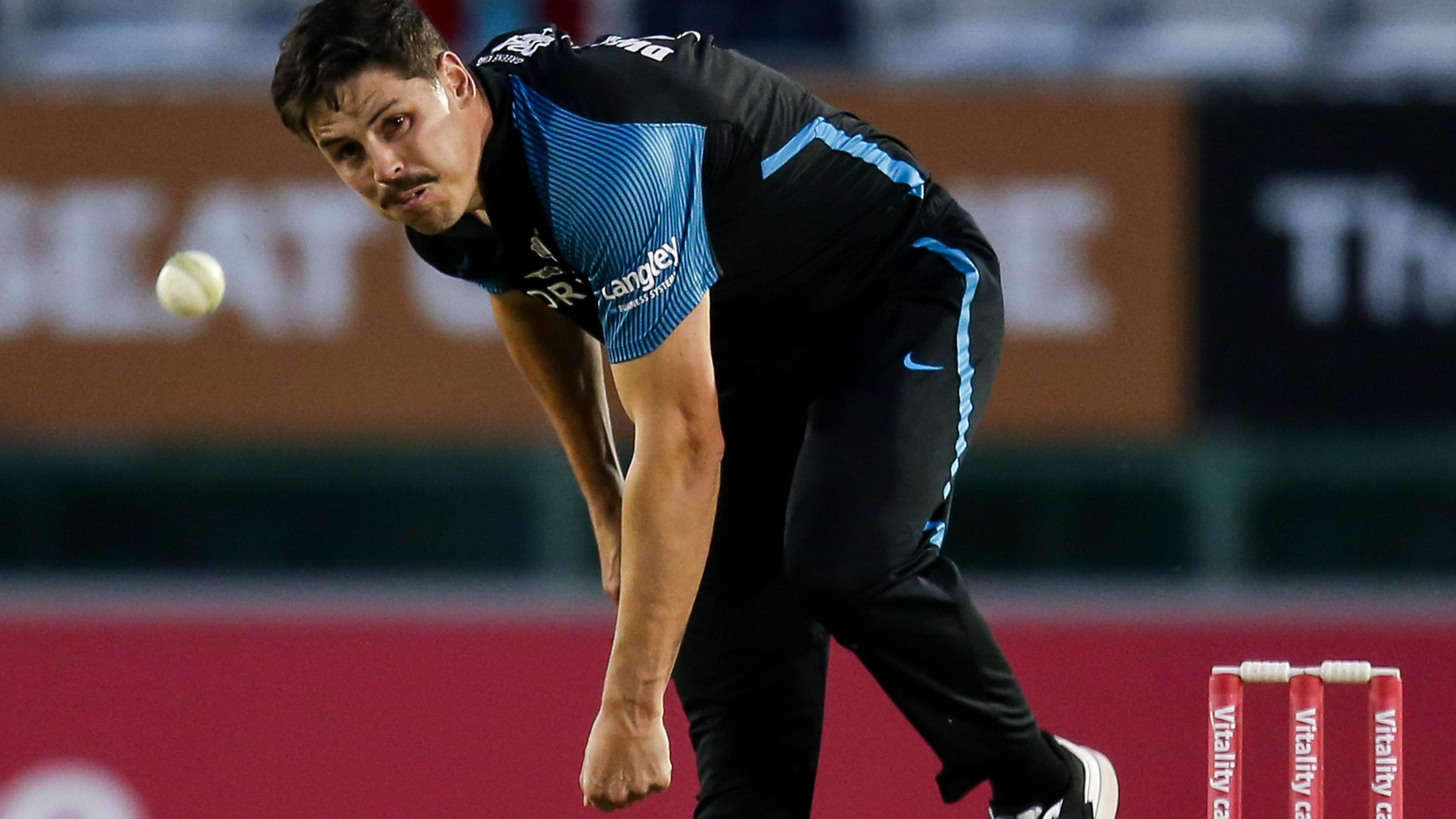 Ben Dwarshuis releases the ball in his delivery stride during a T20 game for Worcestershire