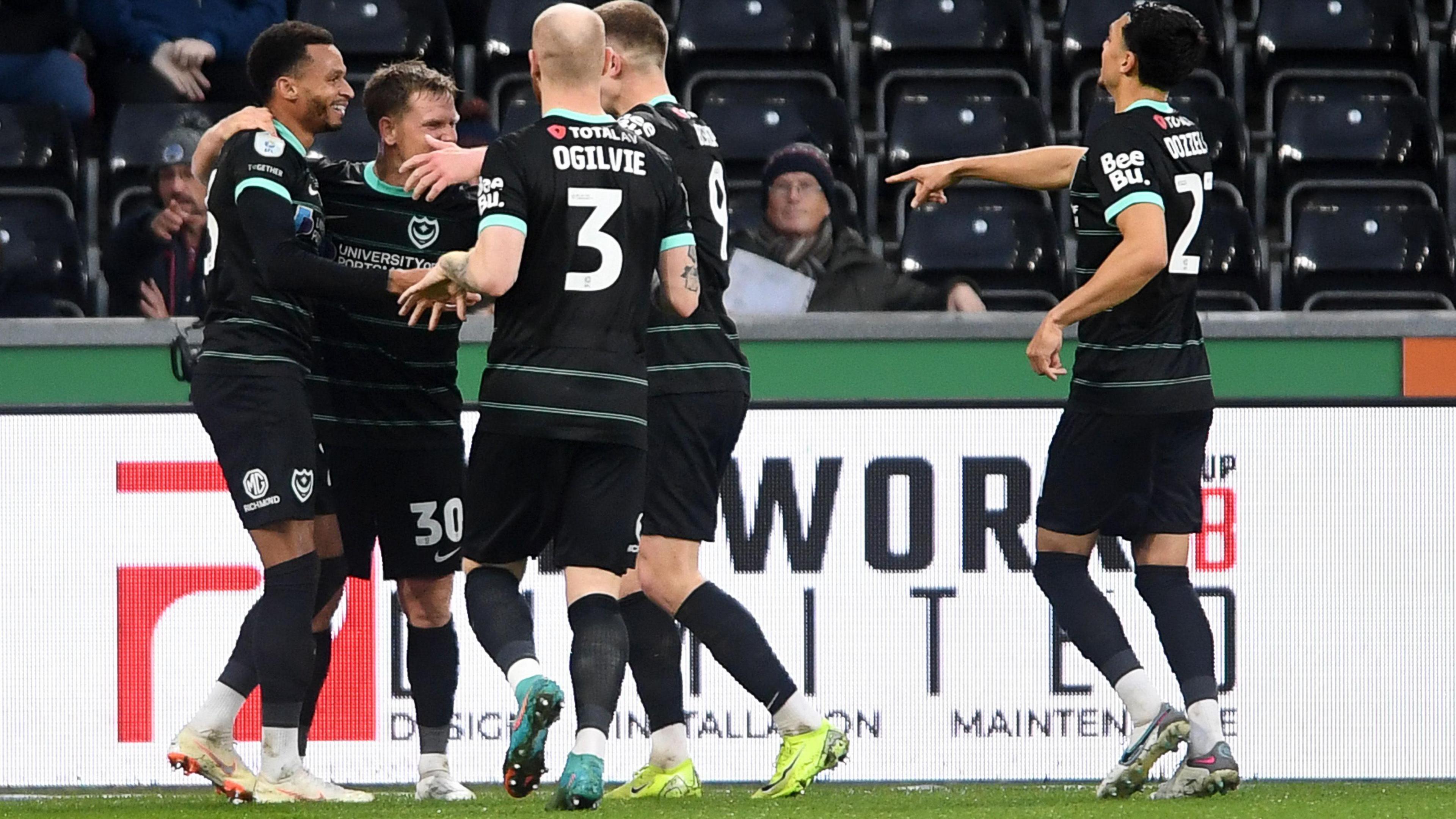 Josh Murphy celebrates his goal with team-mates 