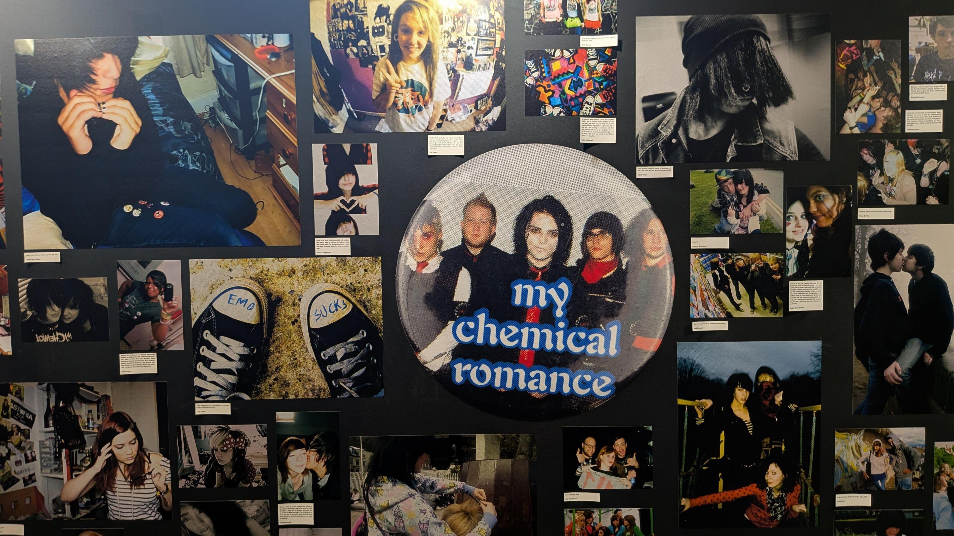 An image of part of the exhibit. Multiple images are stuck on a black wall with a round picture of band My Chemical Romance in the middle.