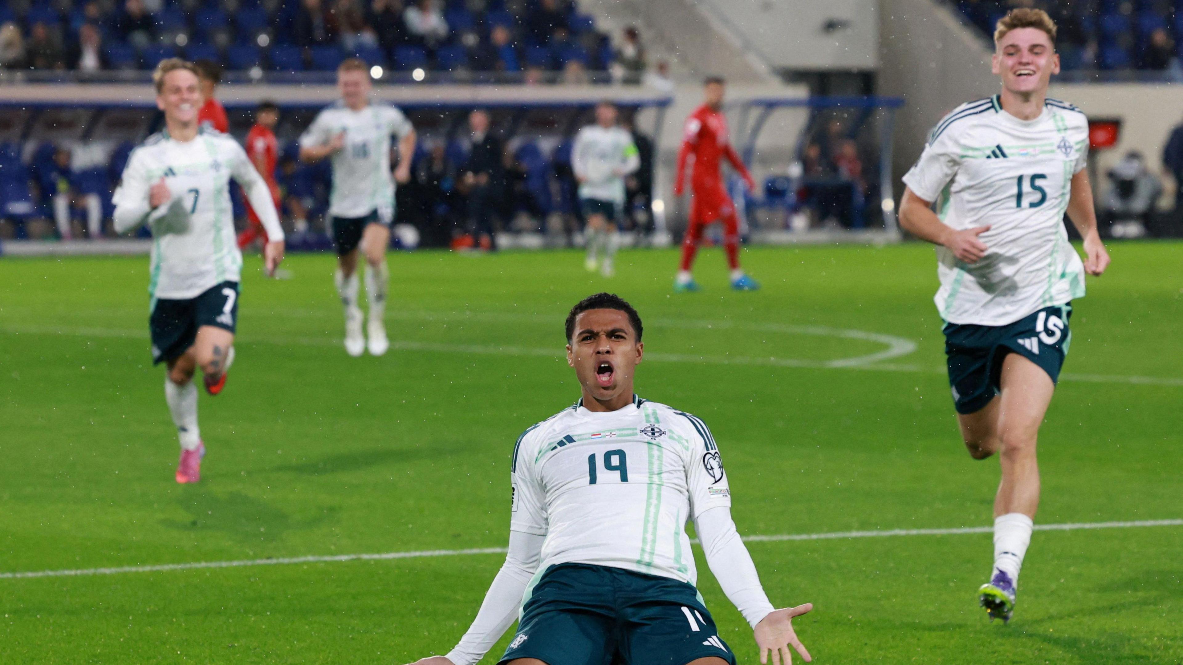 Northern Ireland's Shea Charles celebrates scoring their second goal.