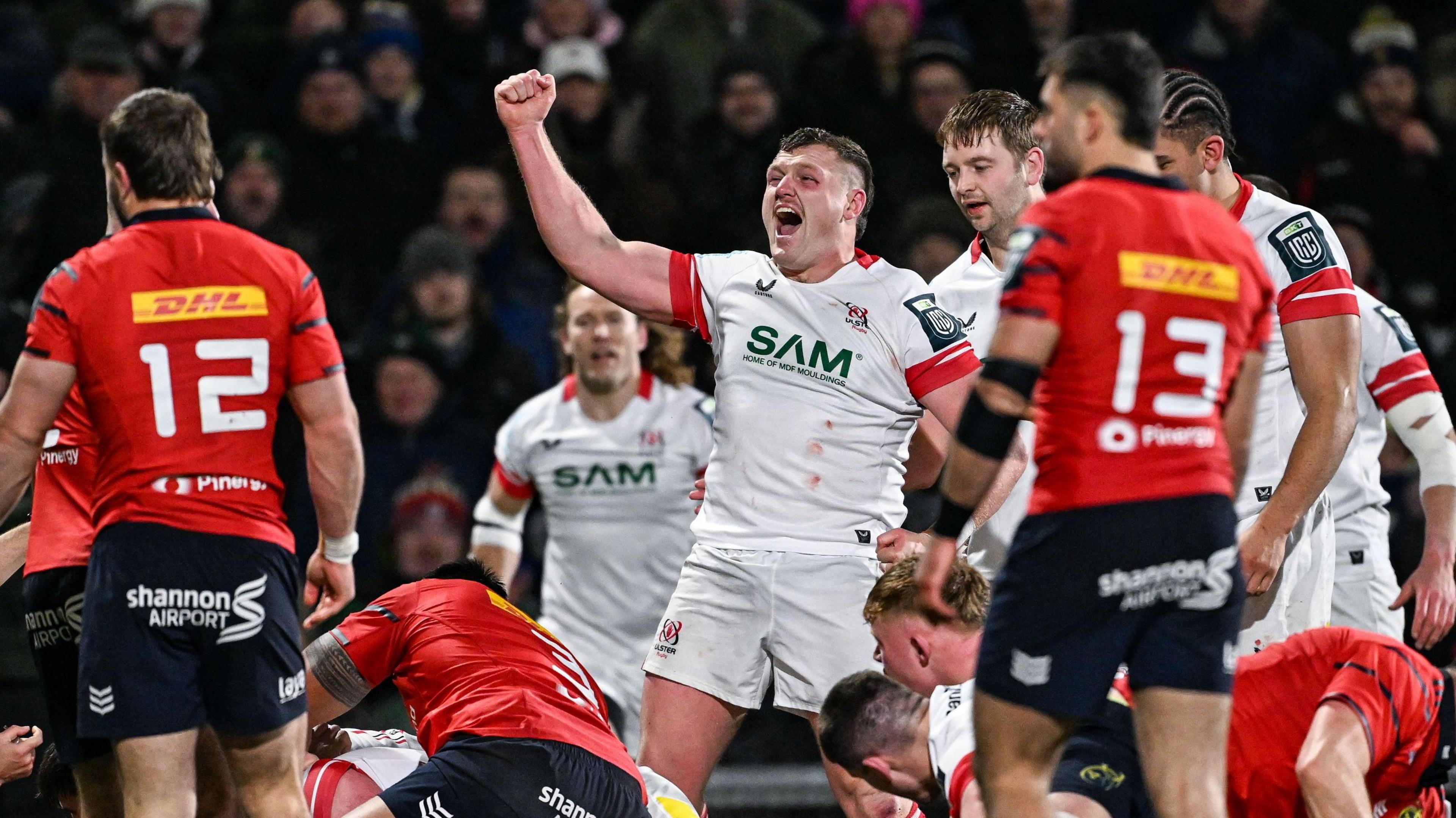 Angus Bell celebrates Ulster's first try against Munster.