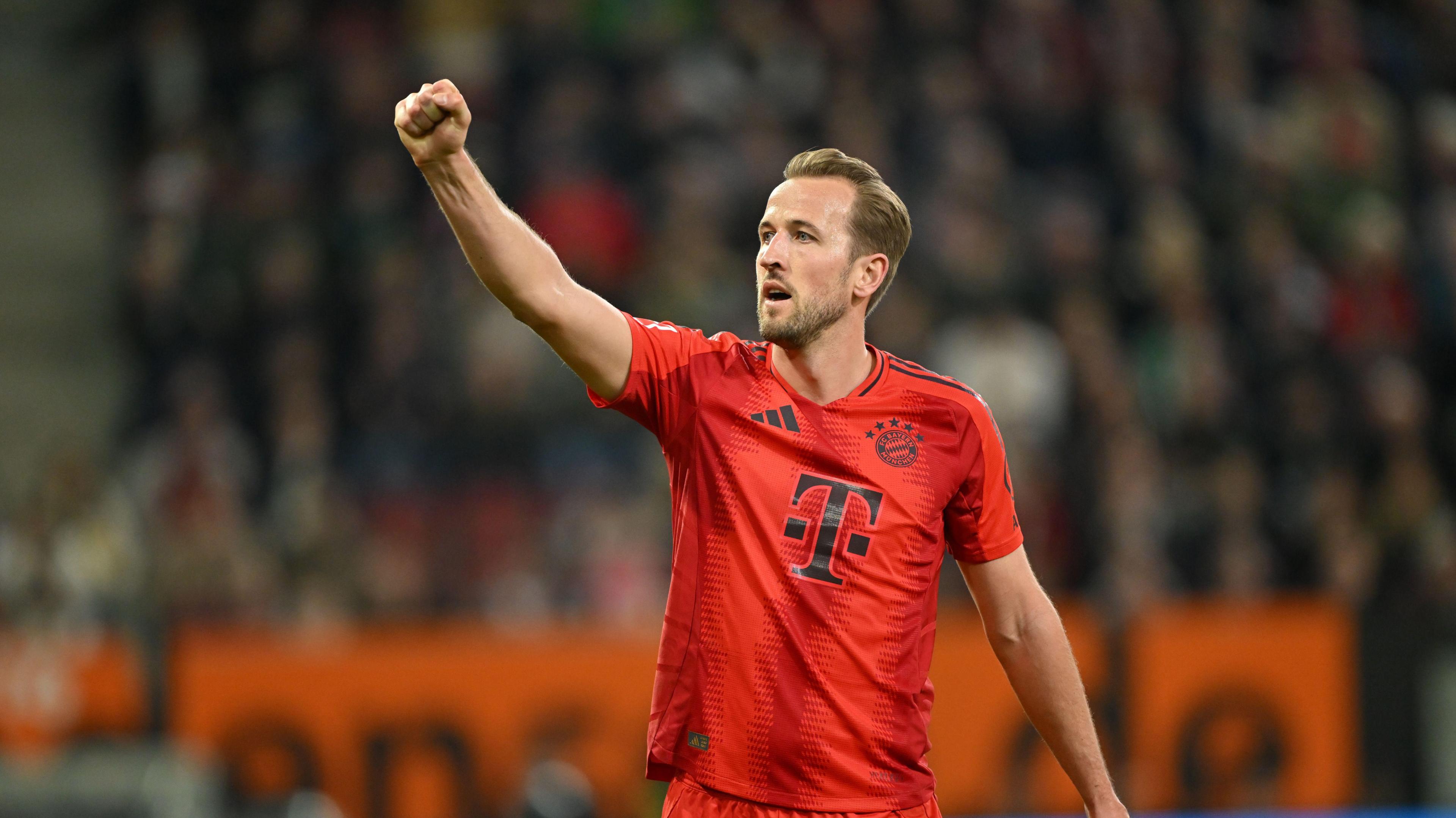 Harry Kane celebrates after scoring