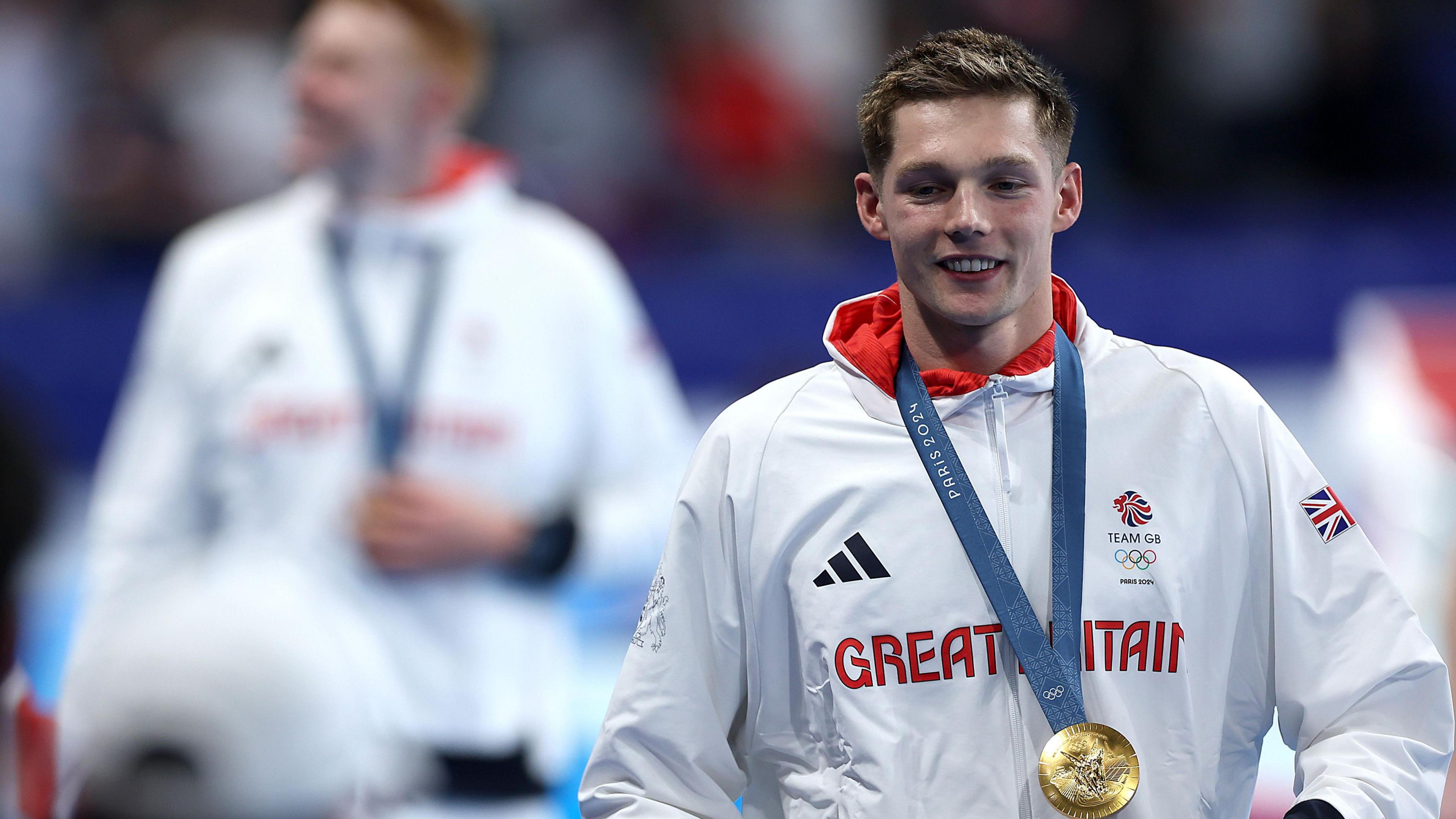 Gold Medalist Duncan Scott of Team Great Britain is seen with his medal following the Swimming medal ceremony after the Men's 4x200m Freestyle Relay Final on day four of the Olympic Games Paris 2024 at Paris La Defense Arena 