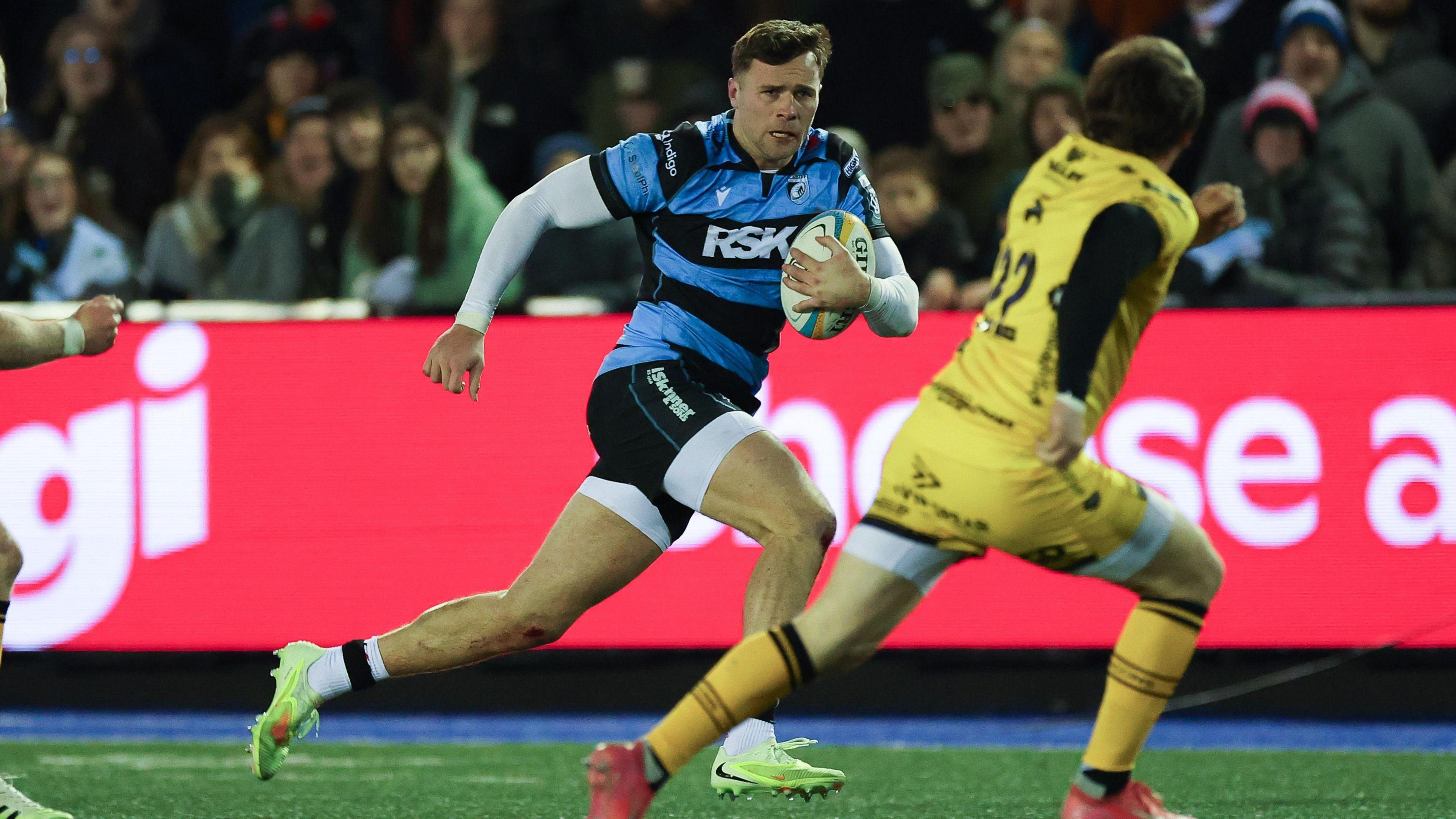 Mason Grady charges down the left wing for Cardiff against Dragons