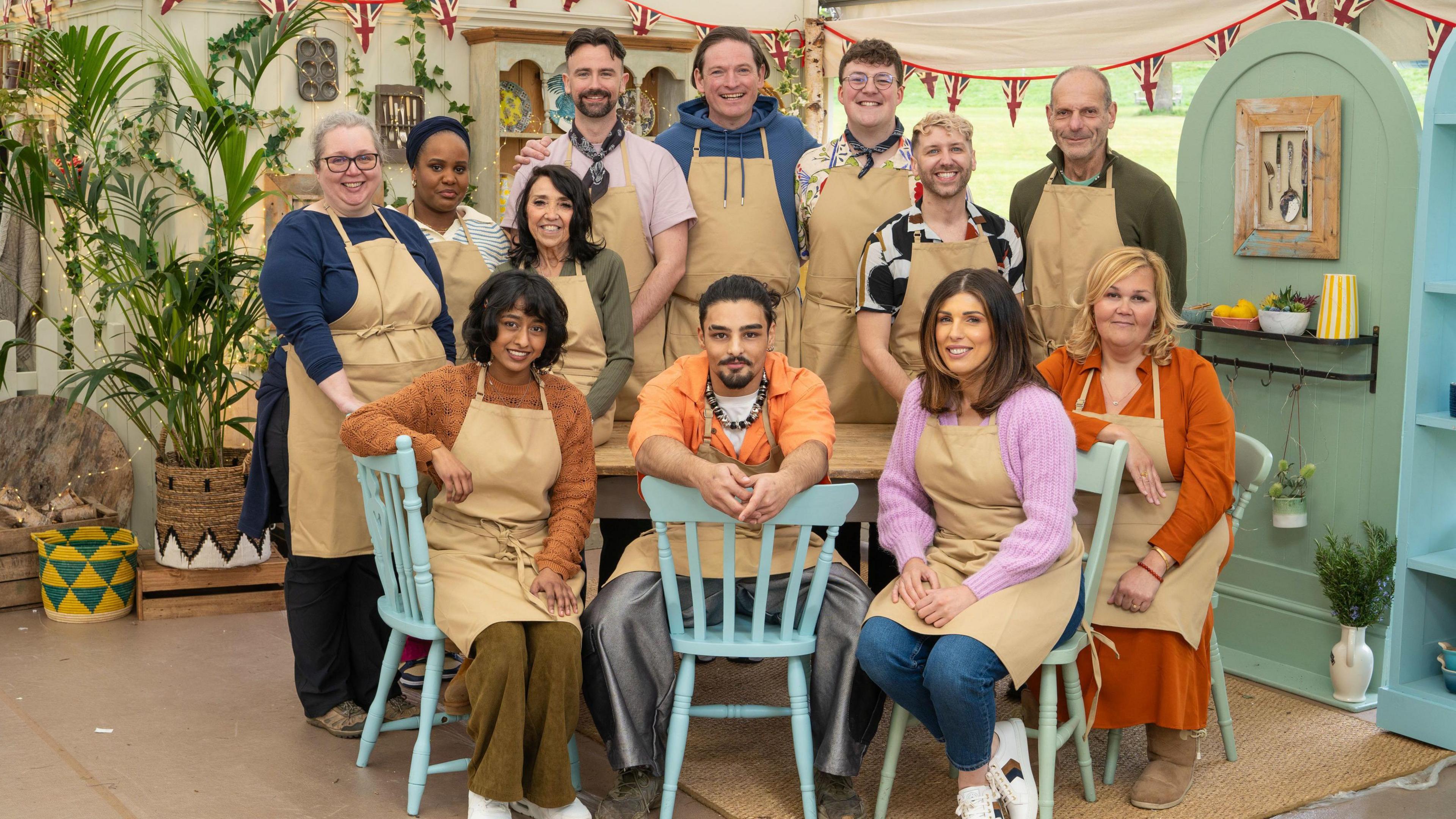 The contestants of the Great British Bake Off for series 15, which ended on 24 November. The eventual winner, Georgie Grasso, is sat along with four other people in the front row with other contestants