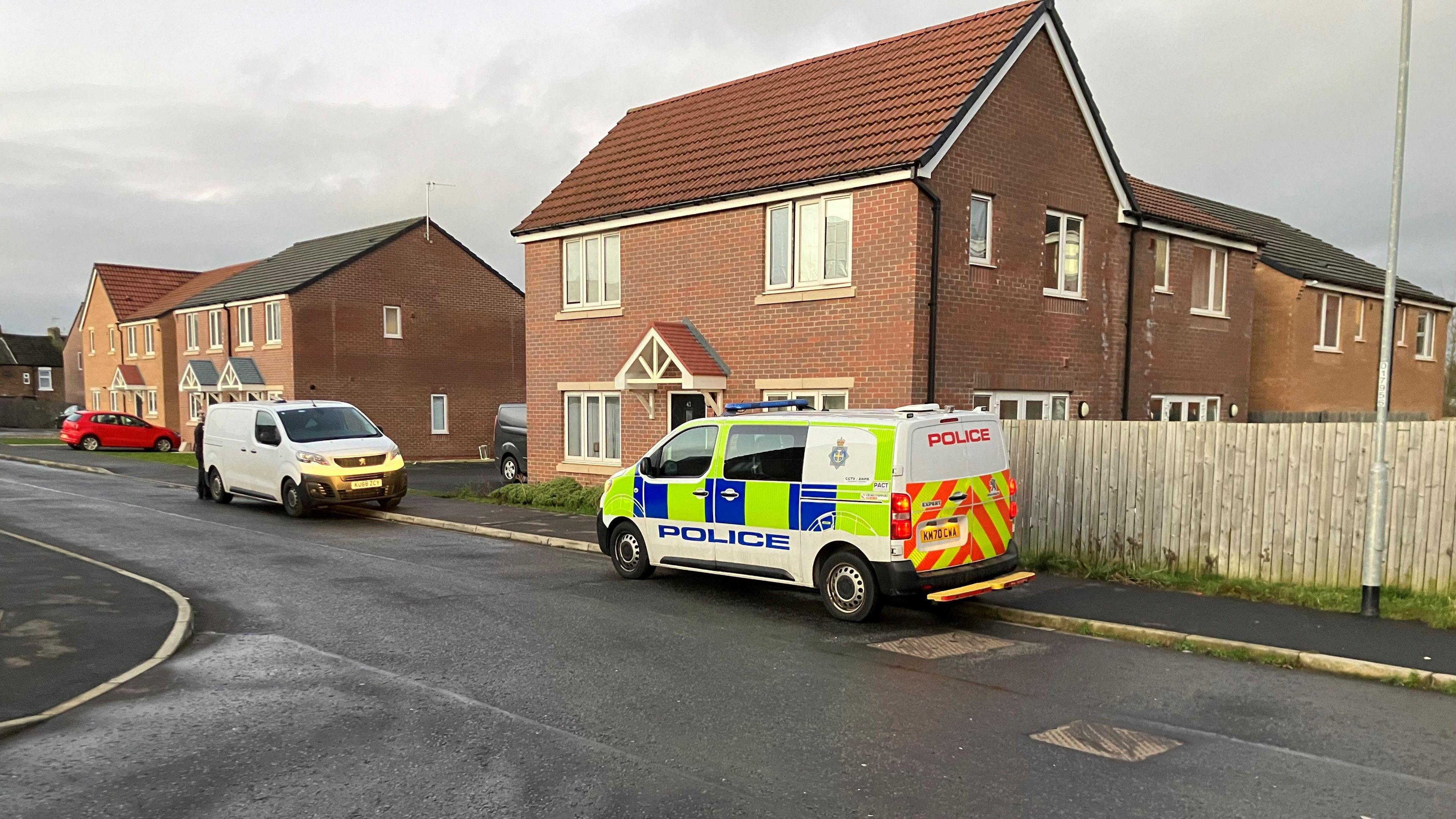 A police van outside a property in Haughton Road, Darlington