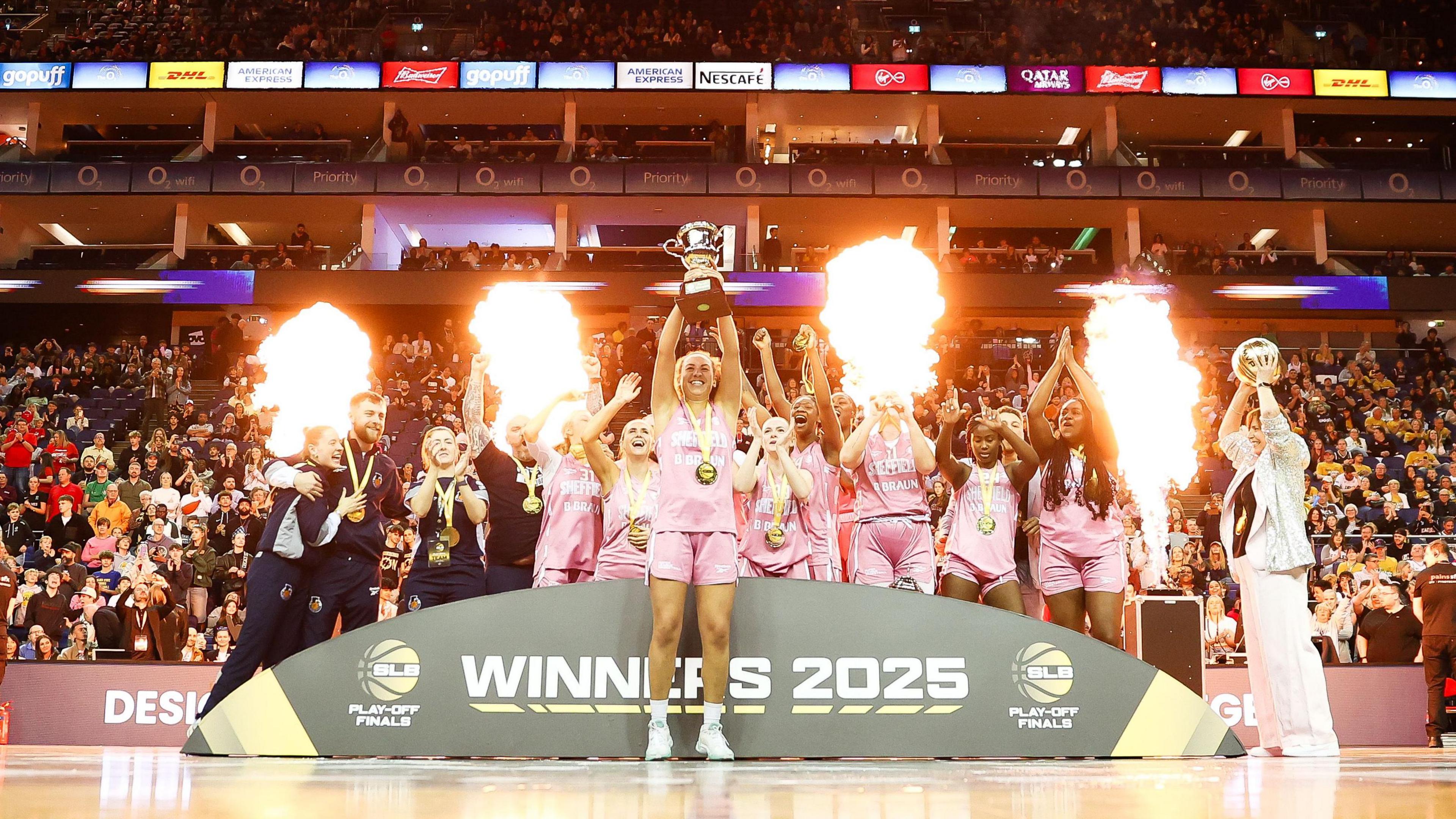 Sheffield Hatters players celebrate with the Women's Super League Basketball trophy