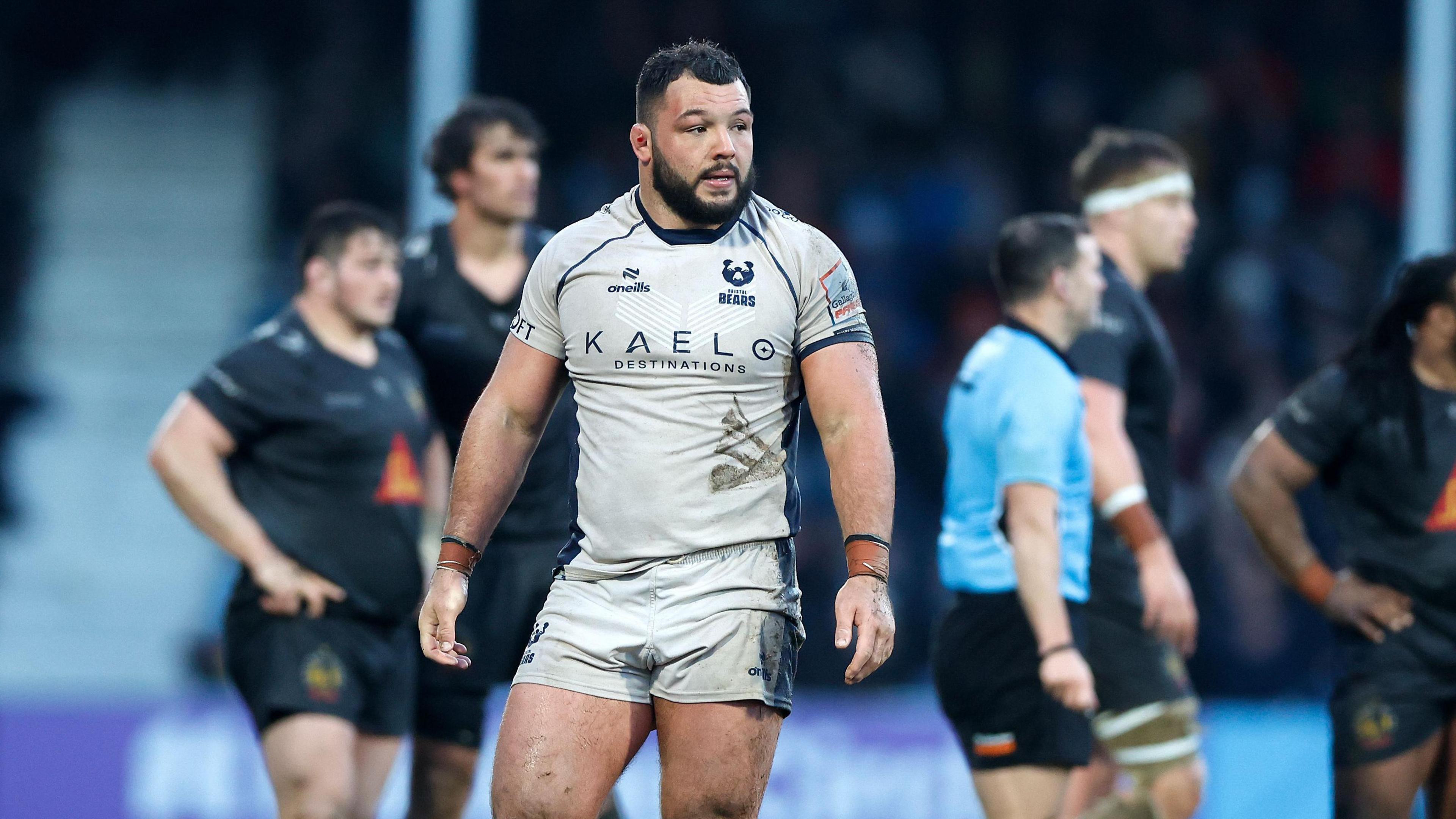 Ellis Genge stands on the pitch during a Bristol match