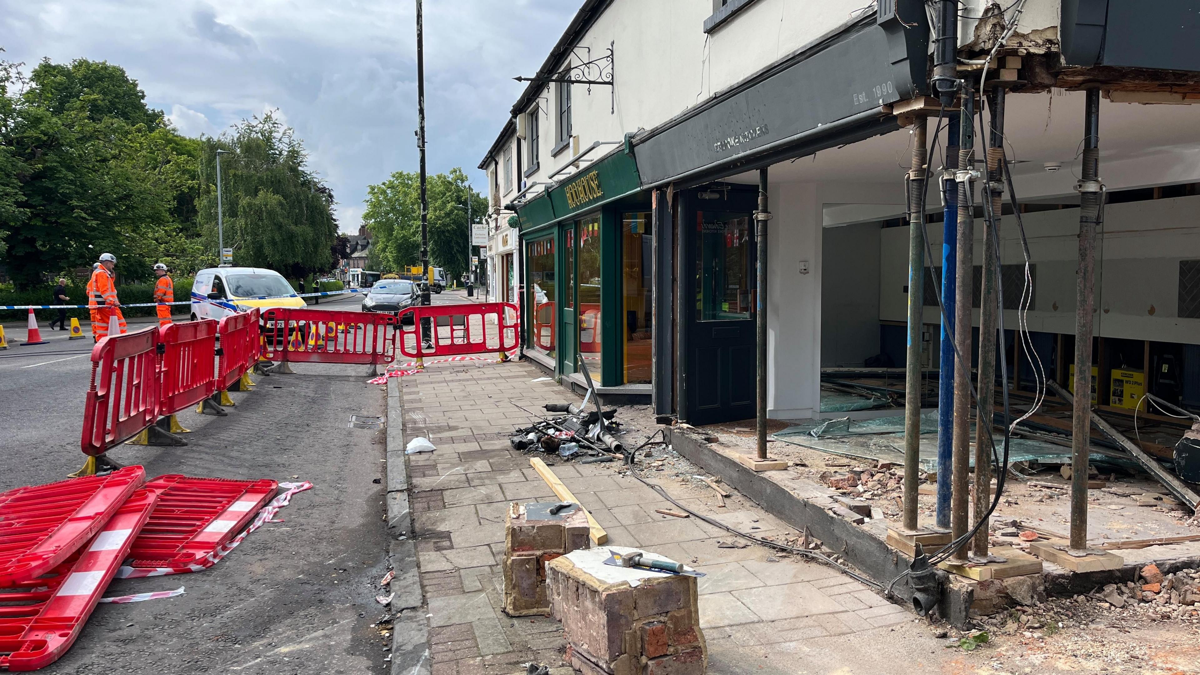 Work has begun on a damaged building which is being supported by scaffolding