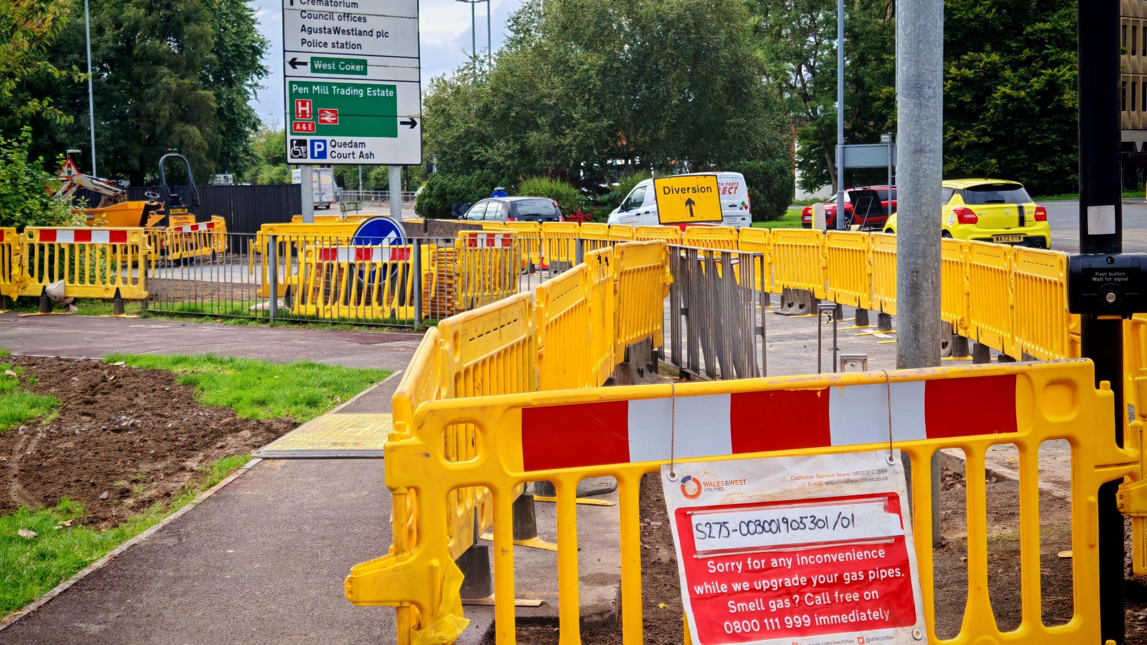 A picture of road signs and queuing traffic in Yeovil.