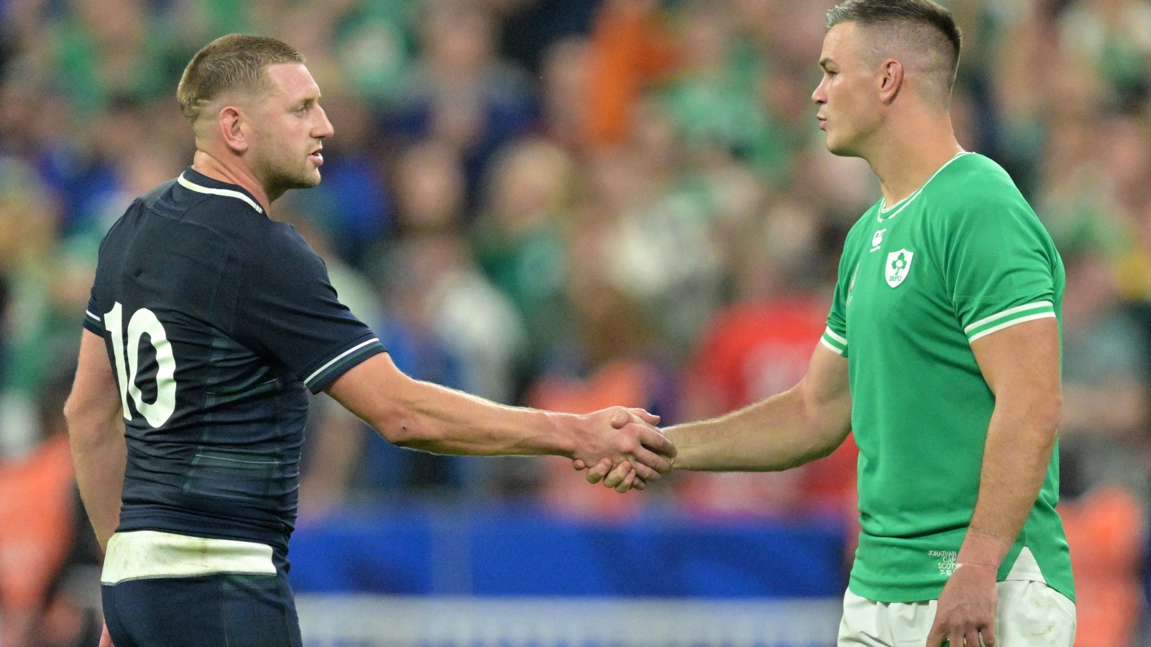 Finn Russell and Johnny Sexton shake hands as Scotland face Ireland