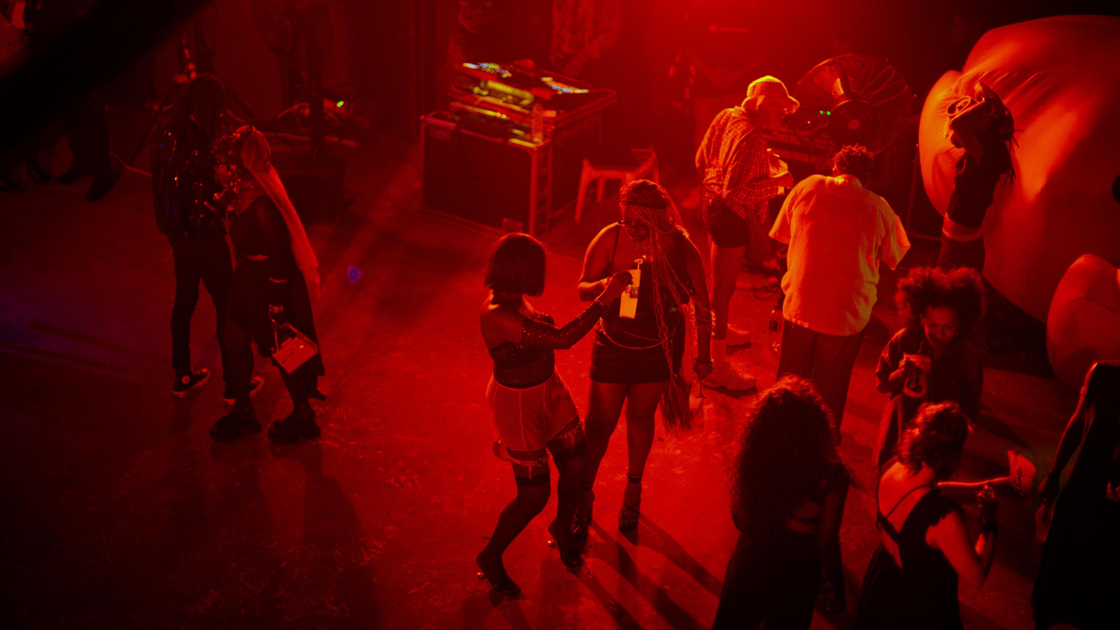 The dancefloor bathed in red light