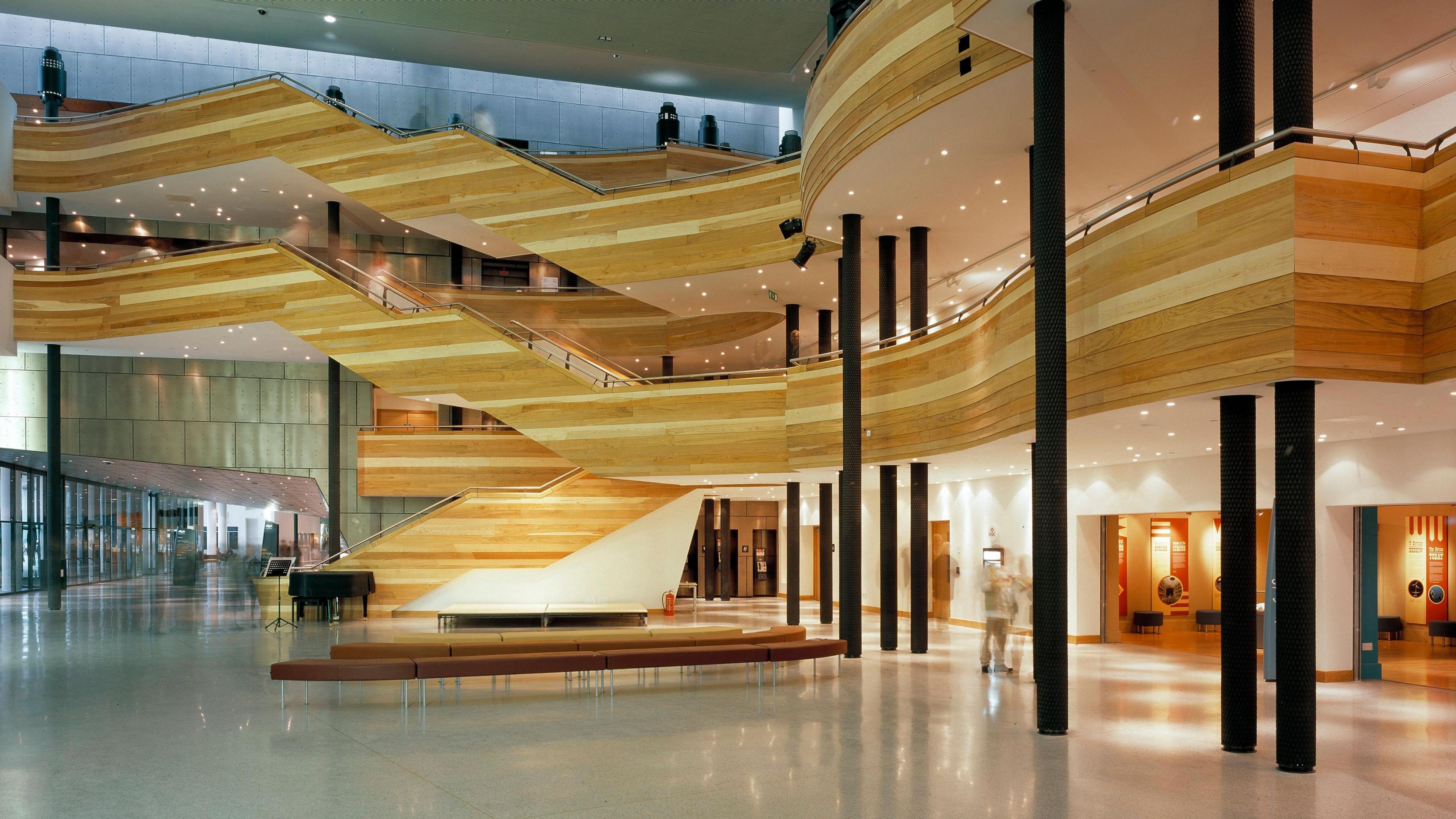 Inside the foyer at the Wales Millennium Centre, with a view of multiple levels and spaces.