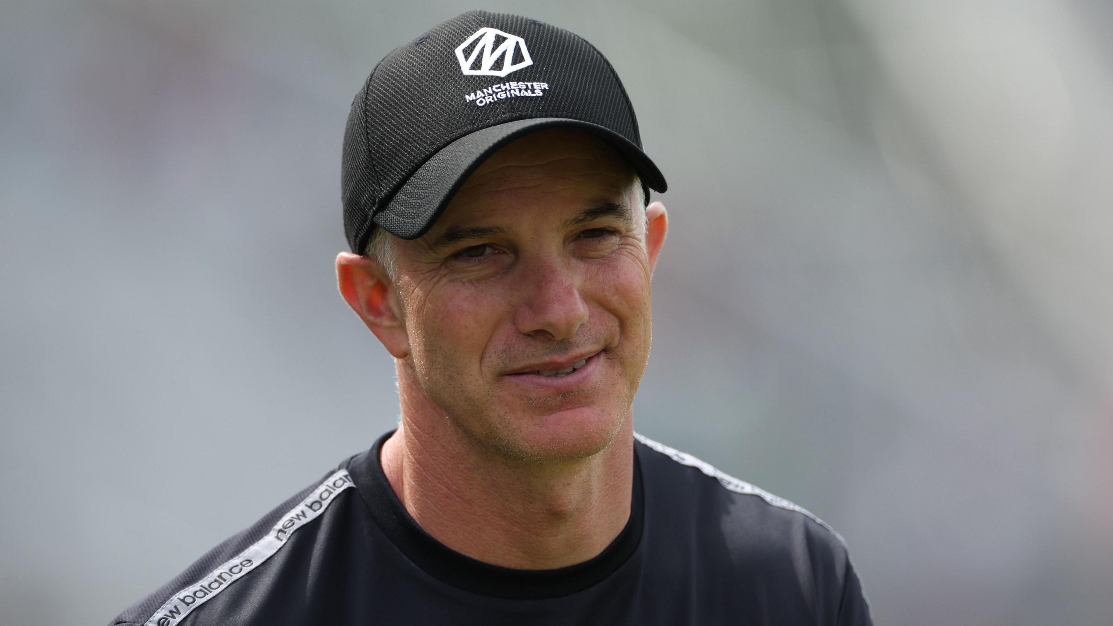 Michael Klinger wearing a Manchester Originals cap