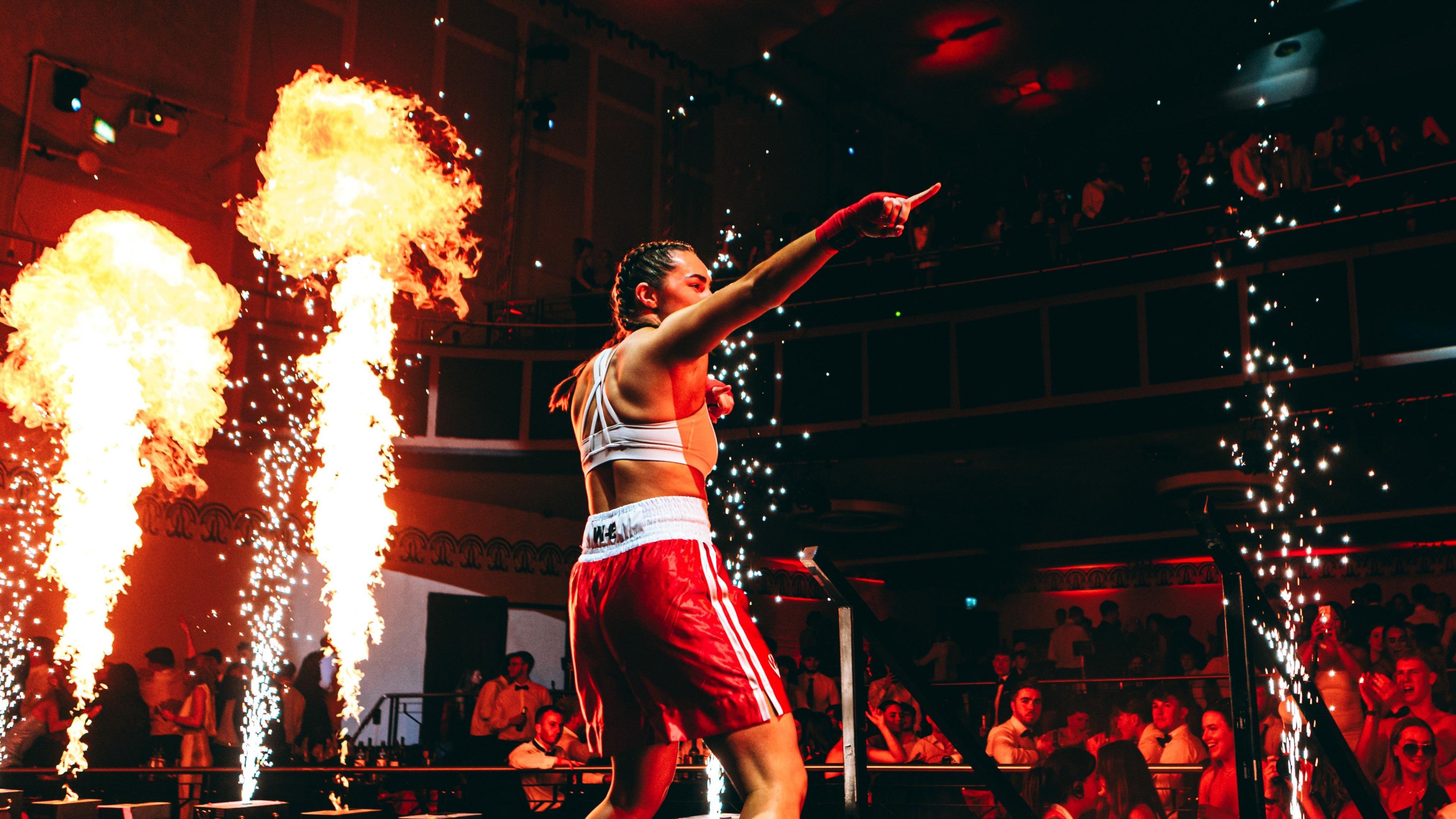 Bo Westcombe Evans poses with fireworks 