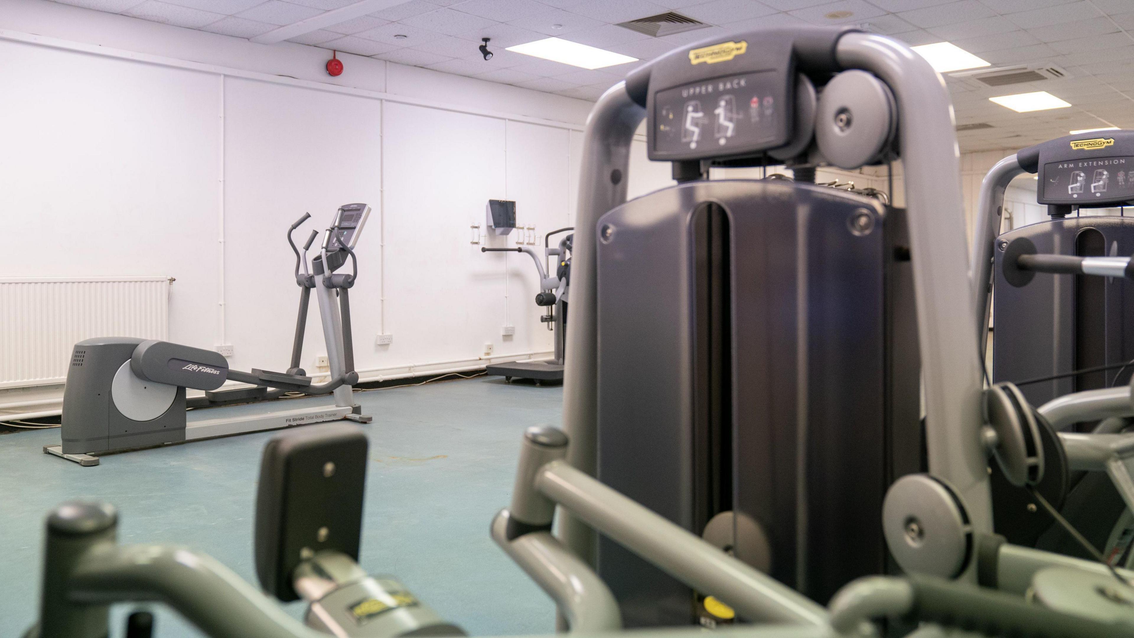 Gym equipment inside a white room at MDP Wethersfield.