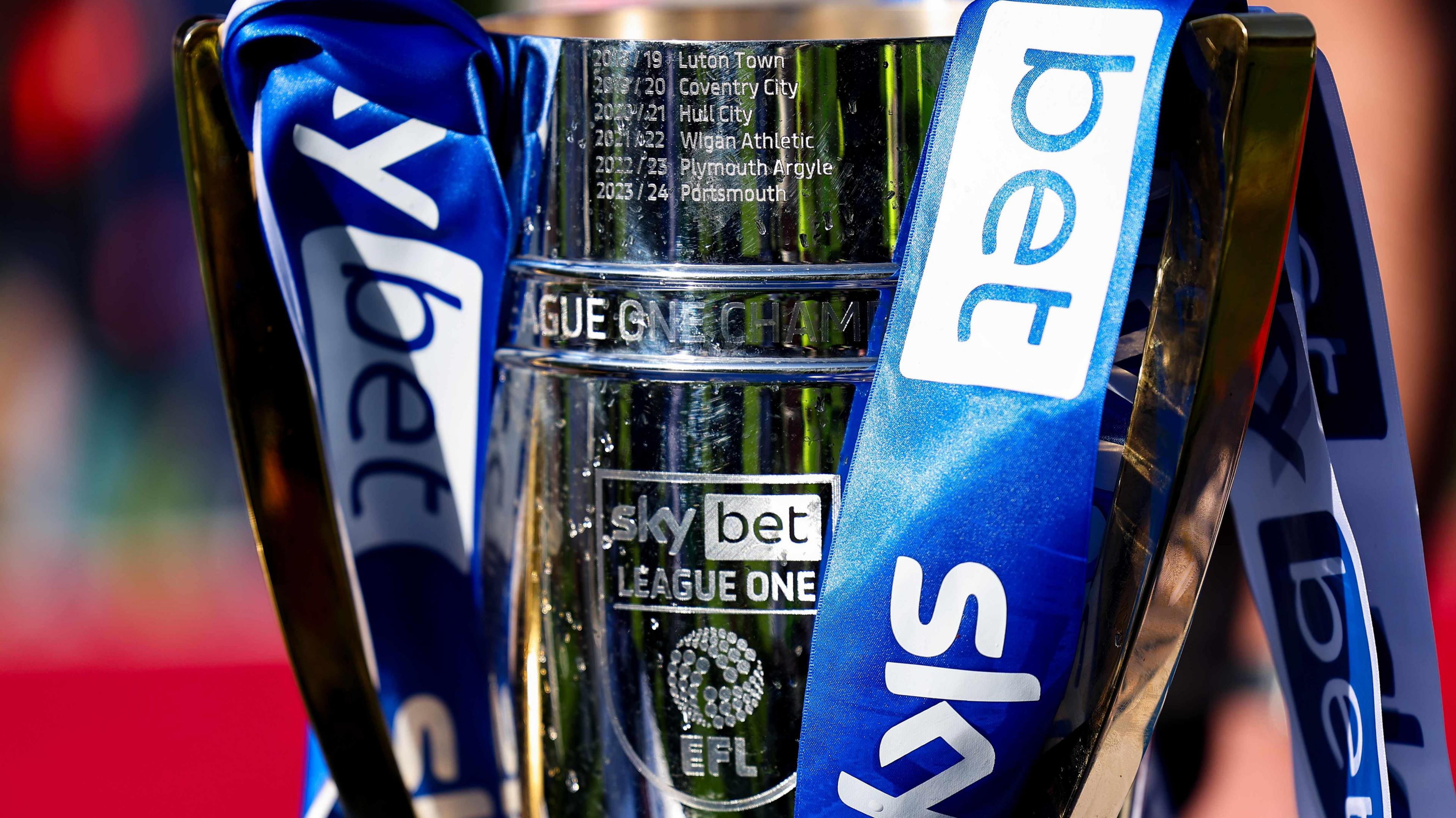 A general view of the EFL League One trophy with blue and white ribbons attached