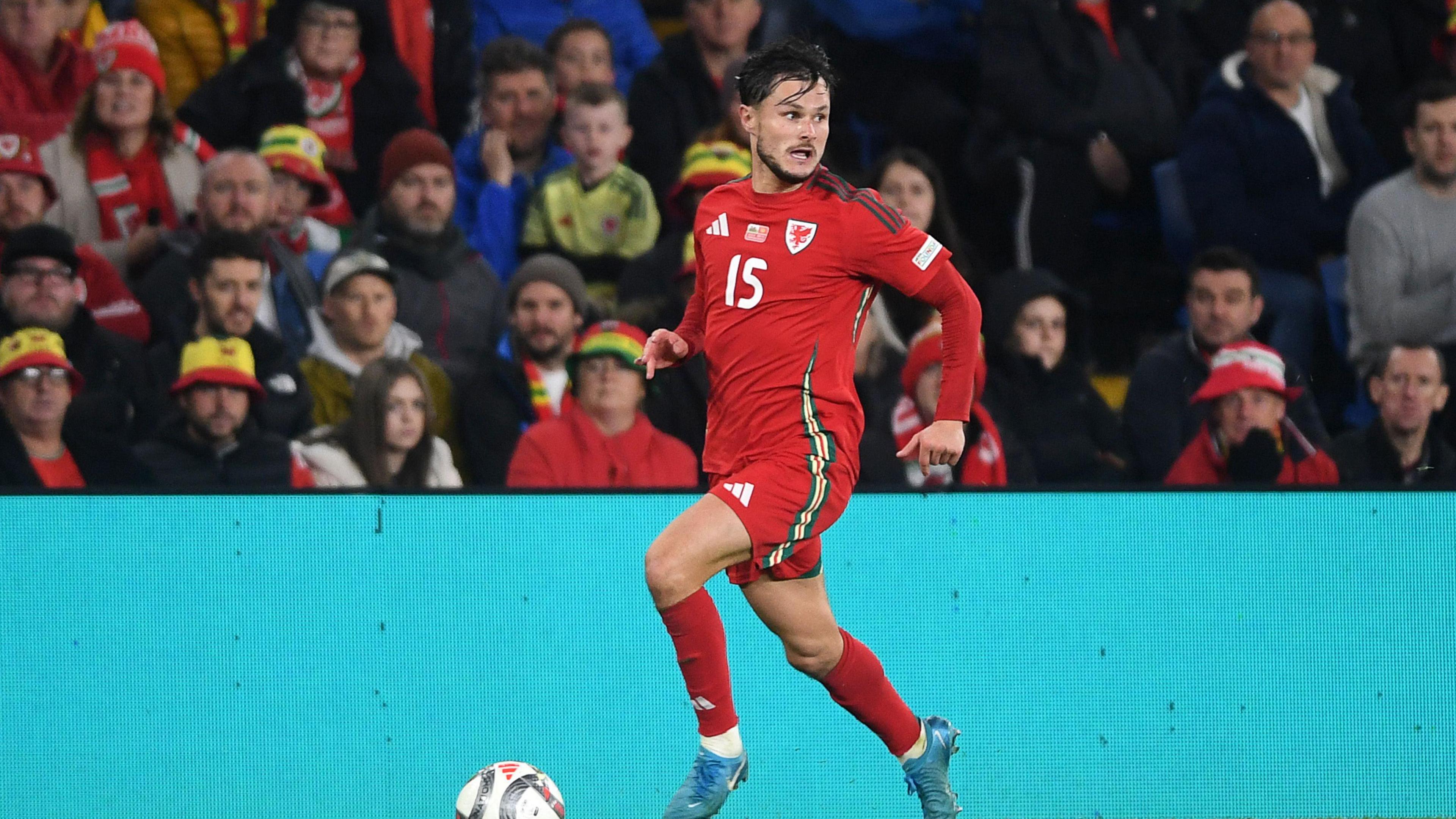 Liam Cullen in action for Wales