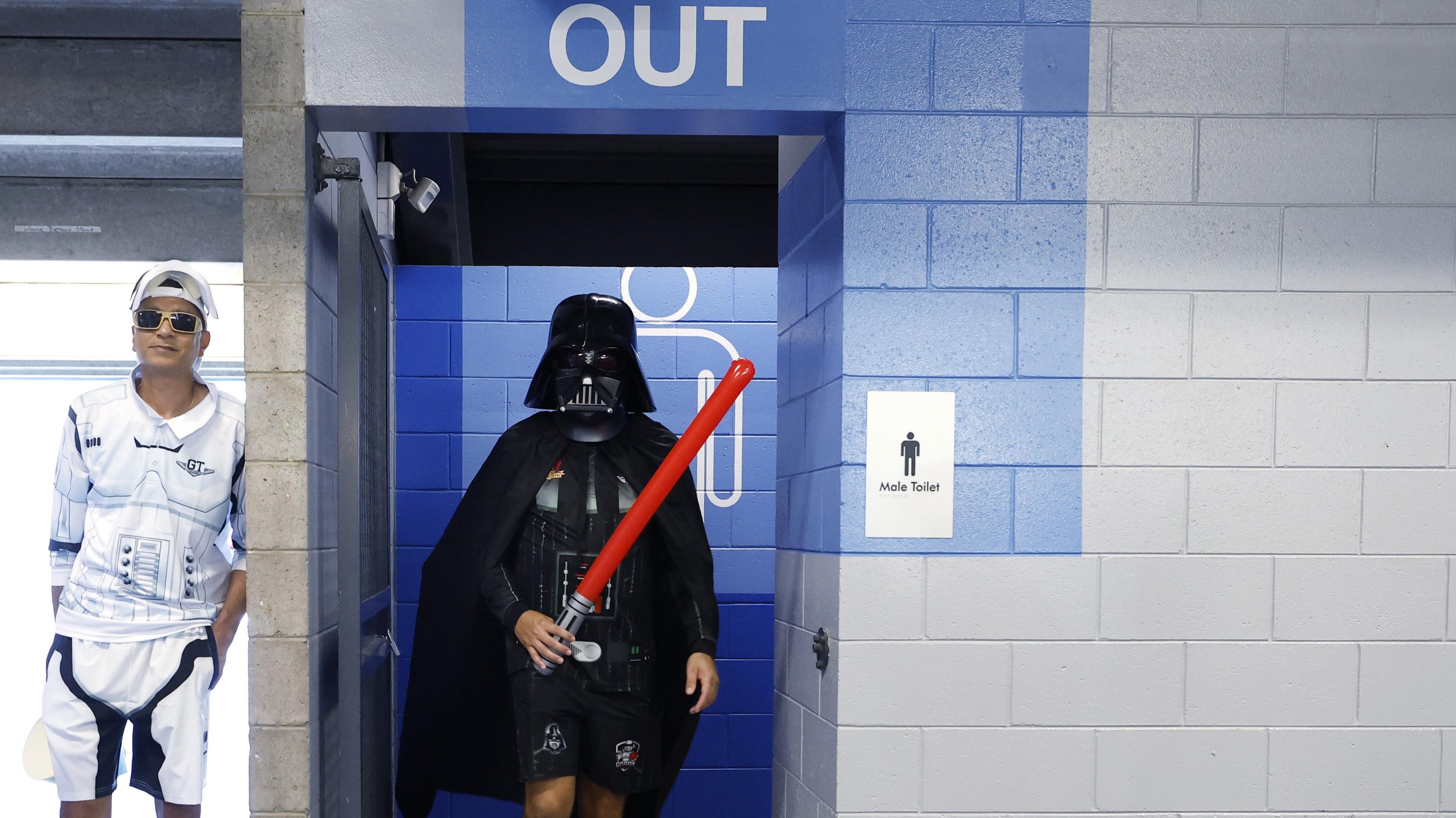 Spectators dressed as stormtroopers