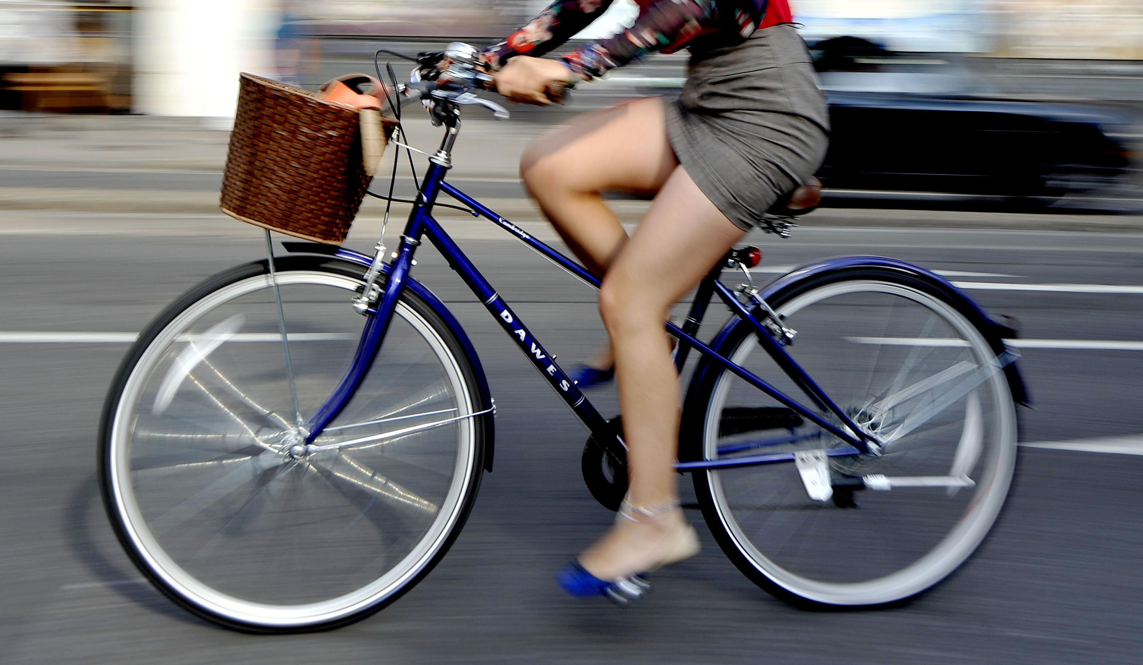 A woman riding a bike