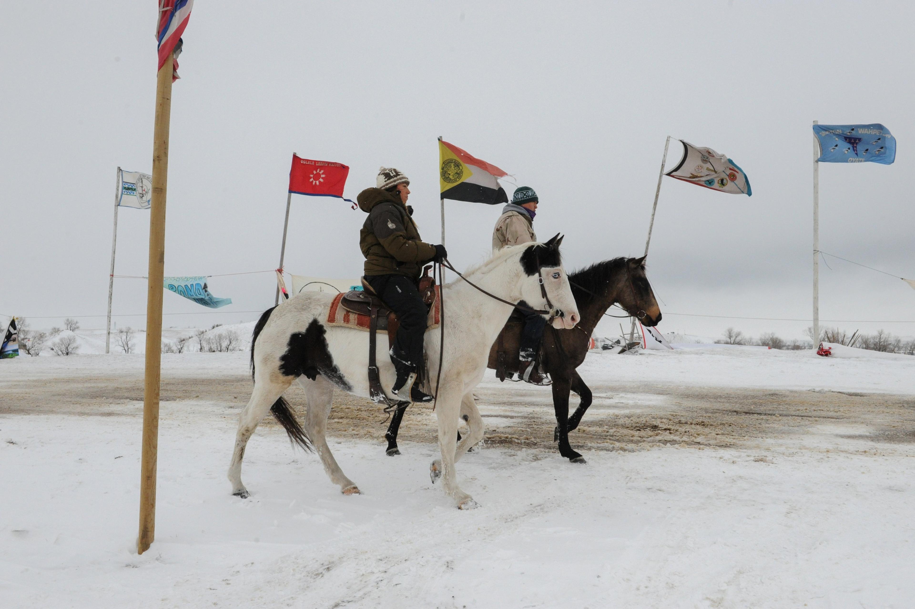 Oceti Sakowin camp horsemen