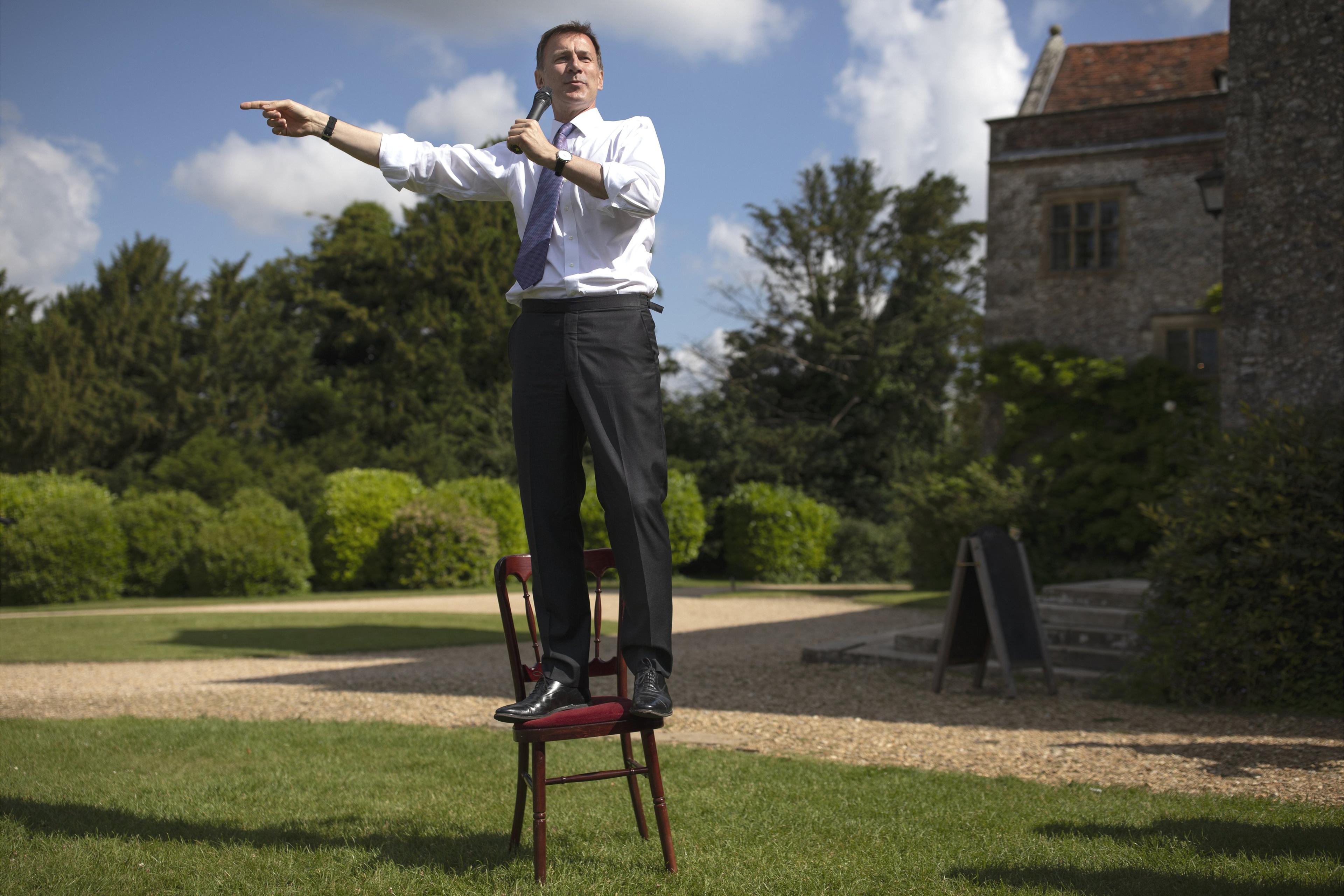 Jeremy Hunt standing on chair