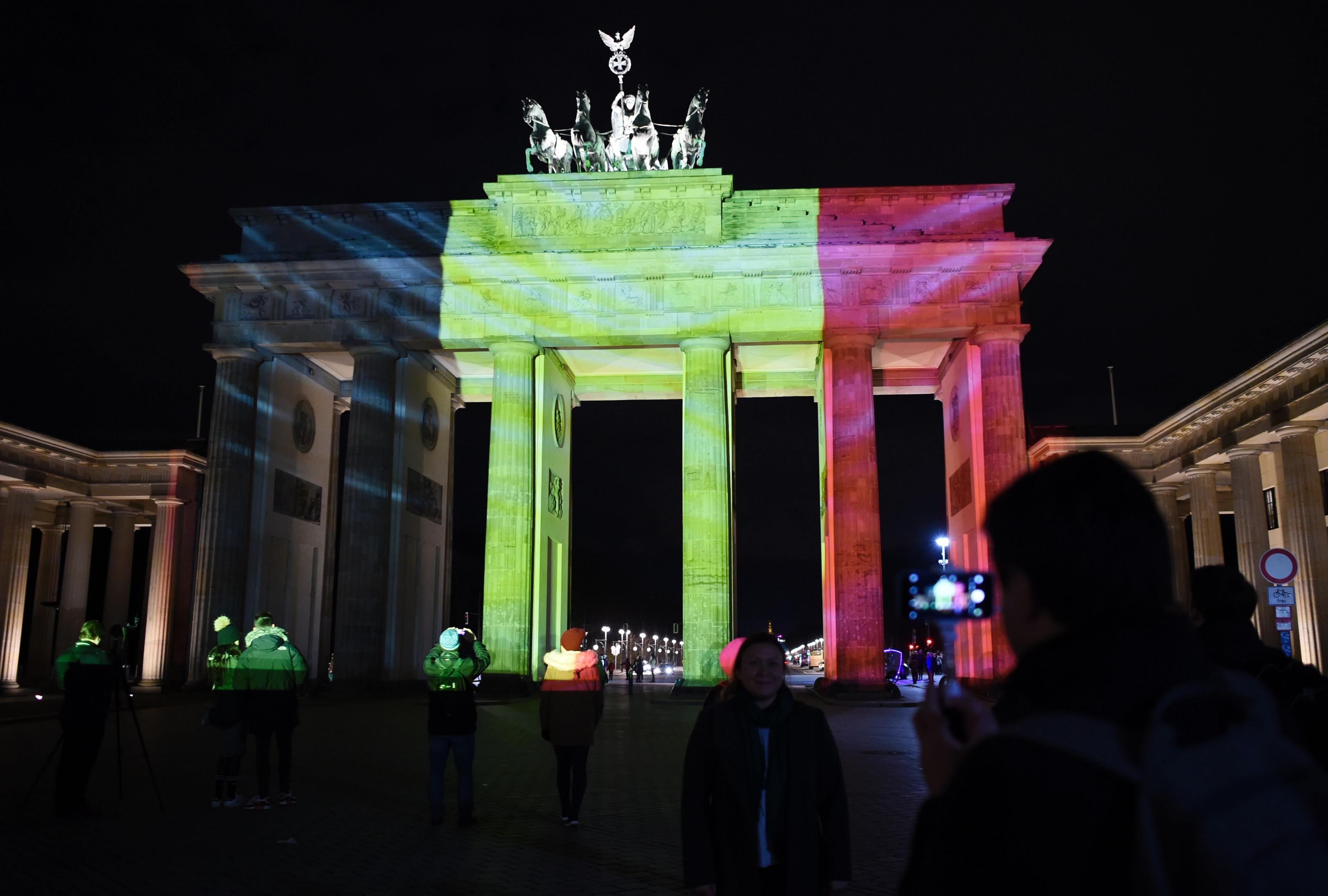 Colours of the Belgian flag projected on to the Brandenburg Gate in Berlin, on 22 March 2016