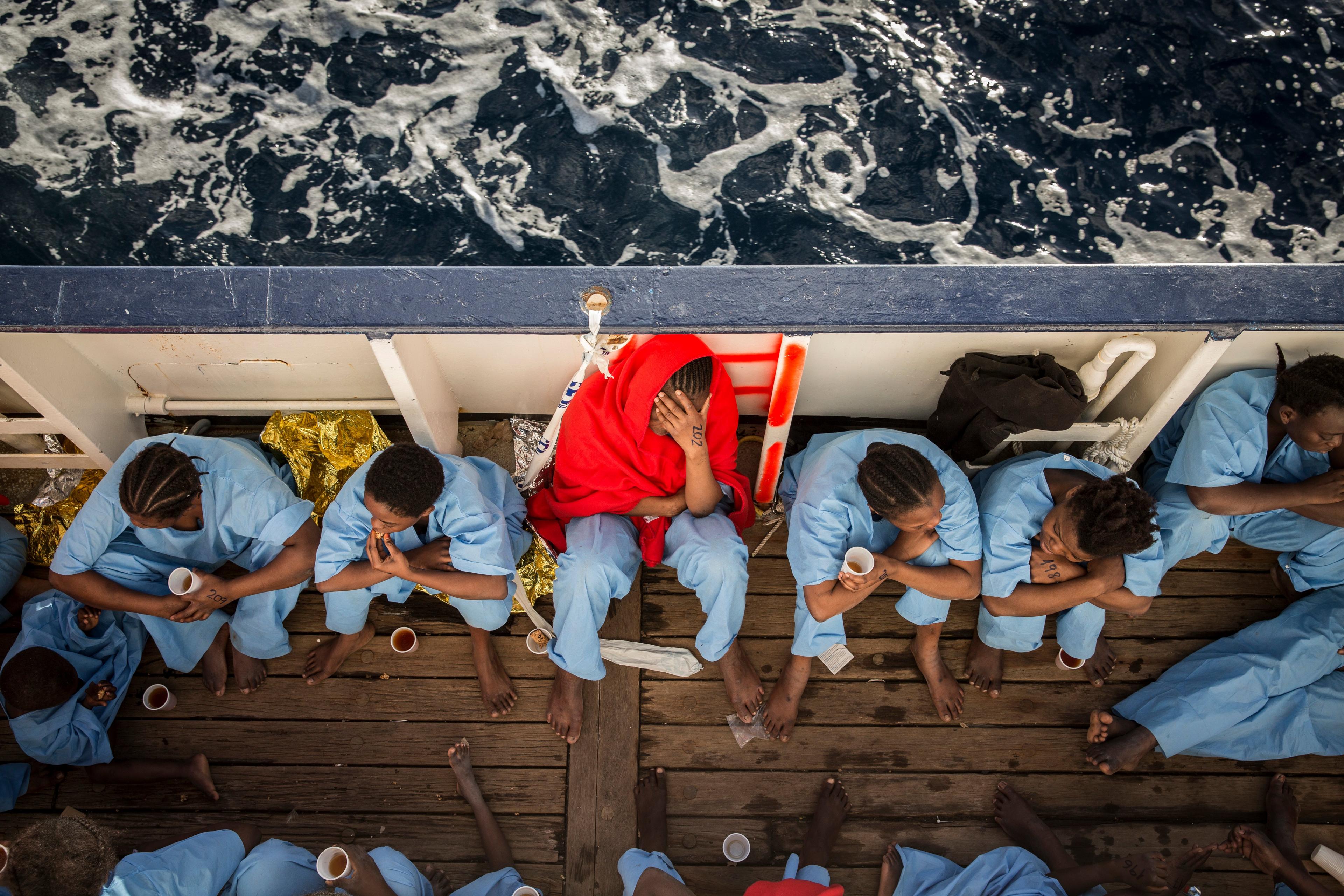 Women from Mali on the deck of the Golfo Azzurro vessel after being rescued from the Mediterranean sea on 13 January 2017