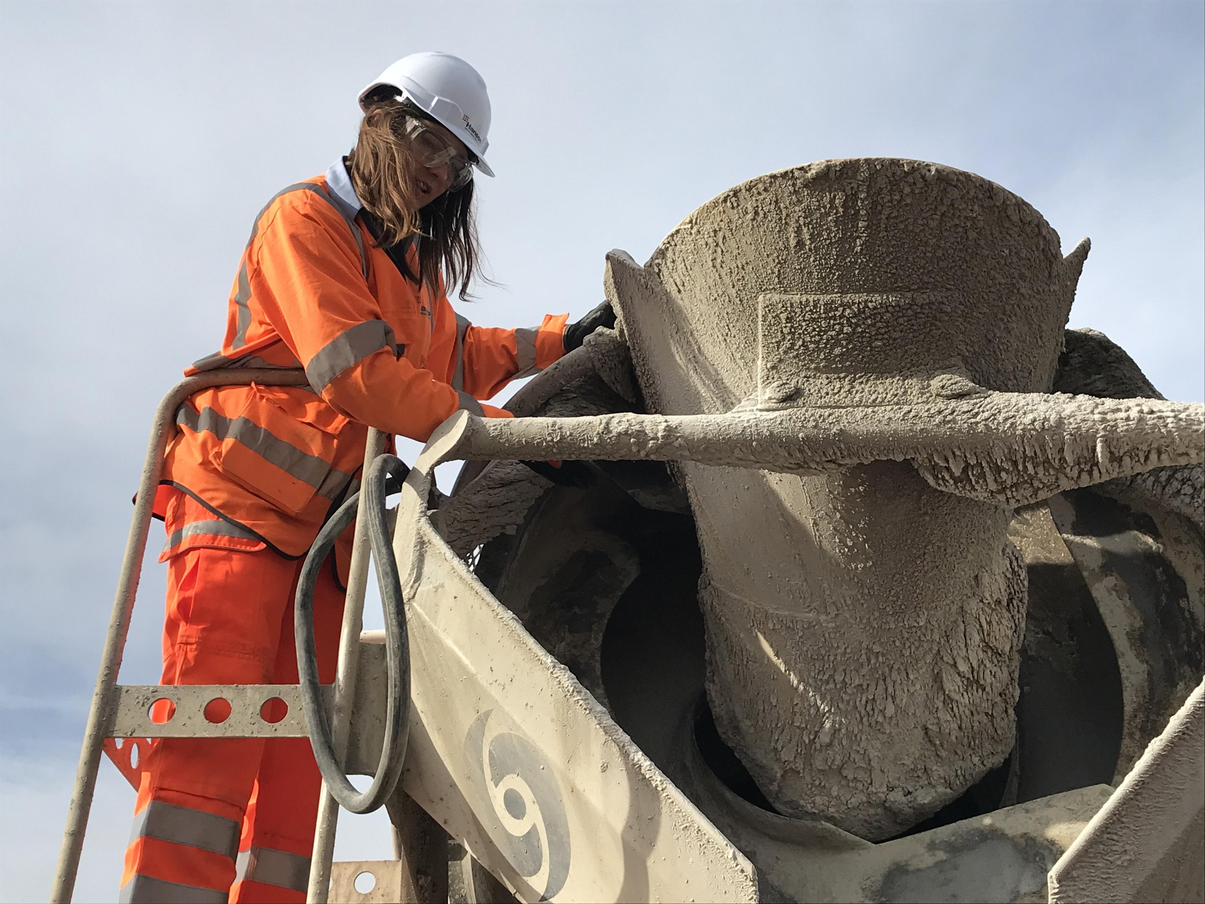 Emily Burridge inspects a batch of concrete