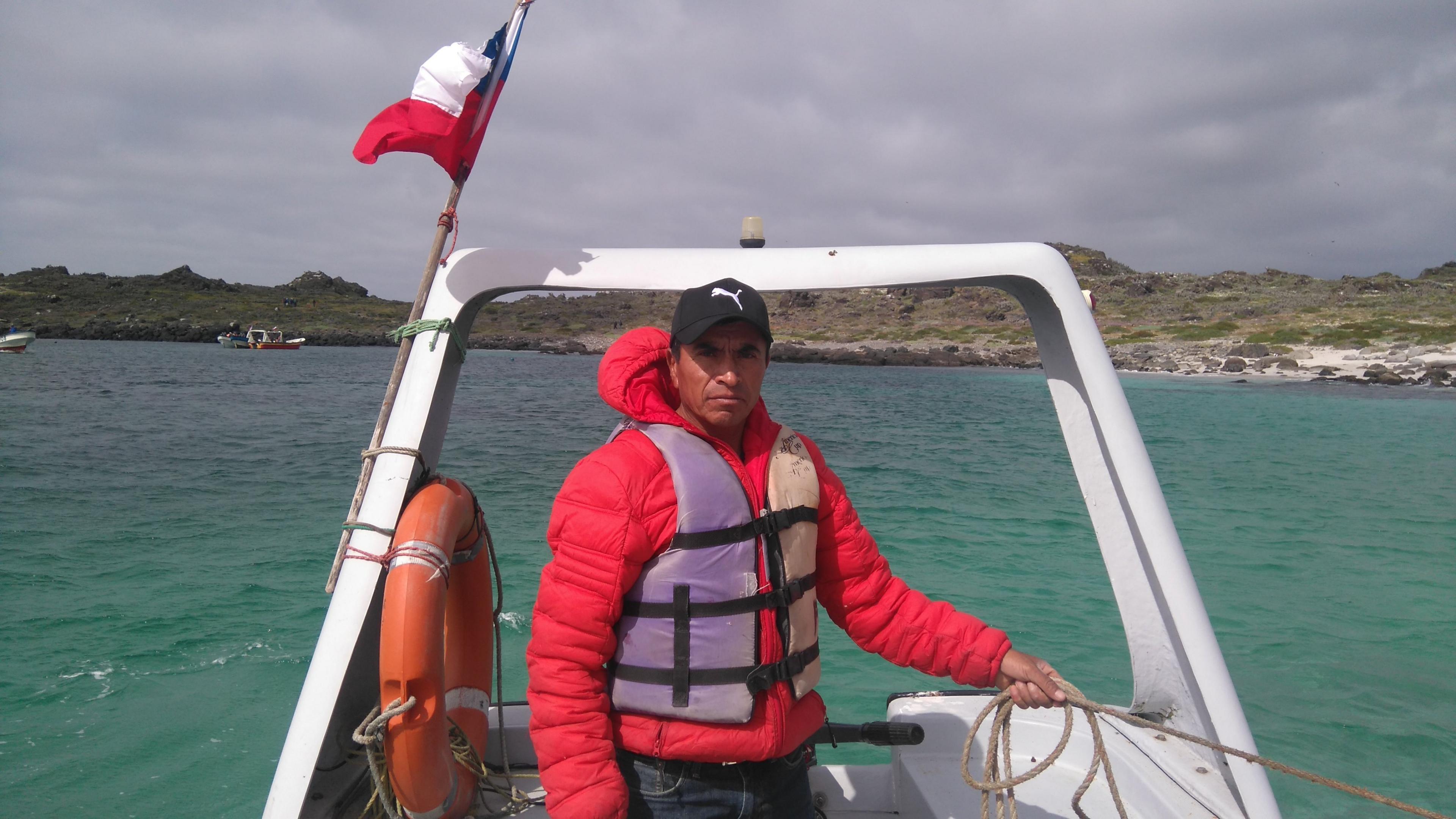 Fisherman Salvador Vergara in a boat